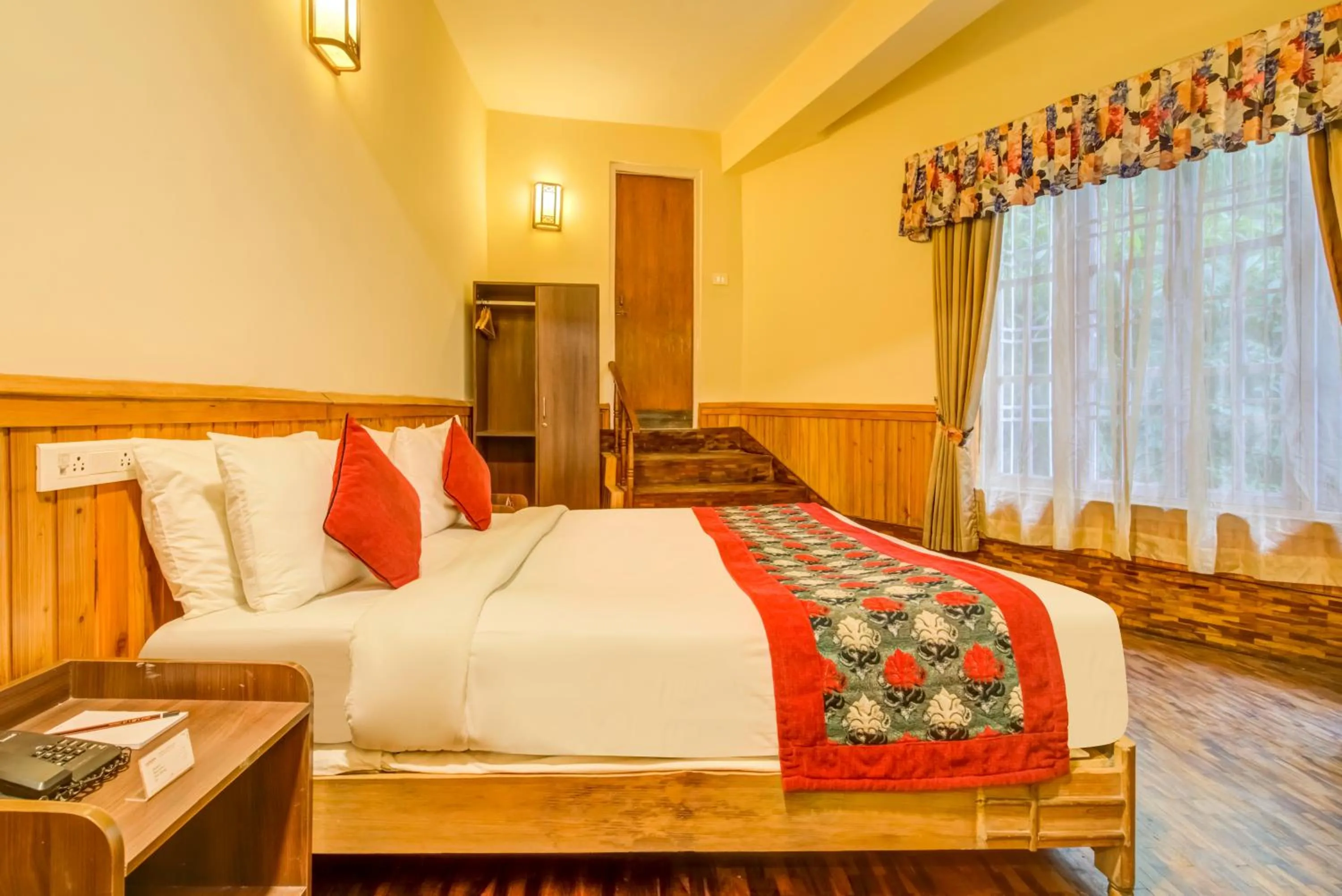 Bed in Summit Newa Regency