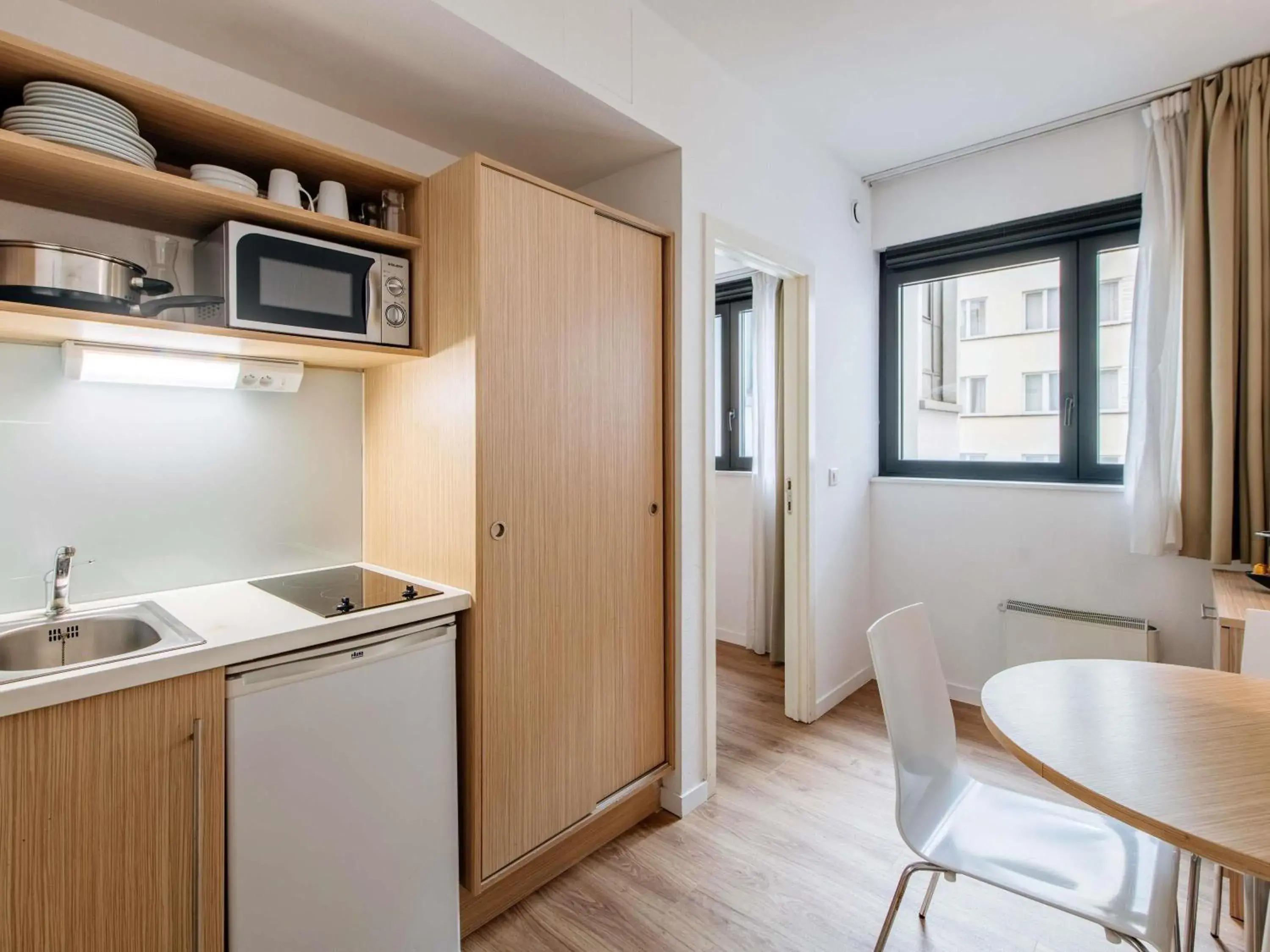 Bedroom in Aparthotel Adagio Access Bruxelles Europe Aparthotel Bedroom in Aparthotel Adagio Access Bruxelles Europe Aparthotel