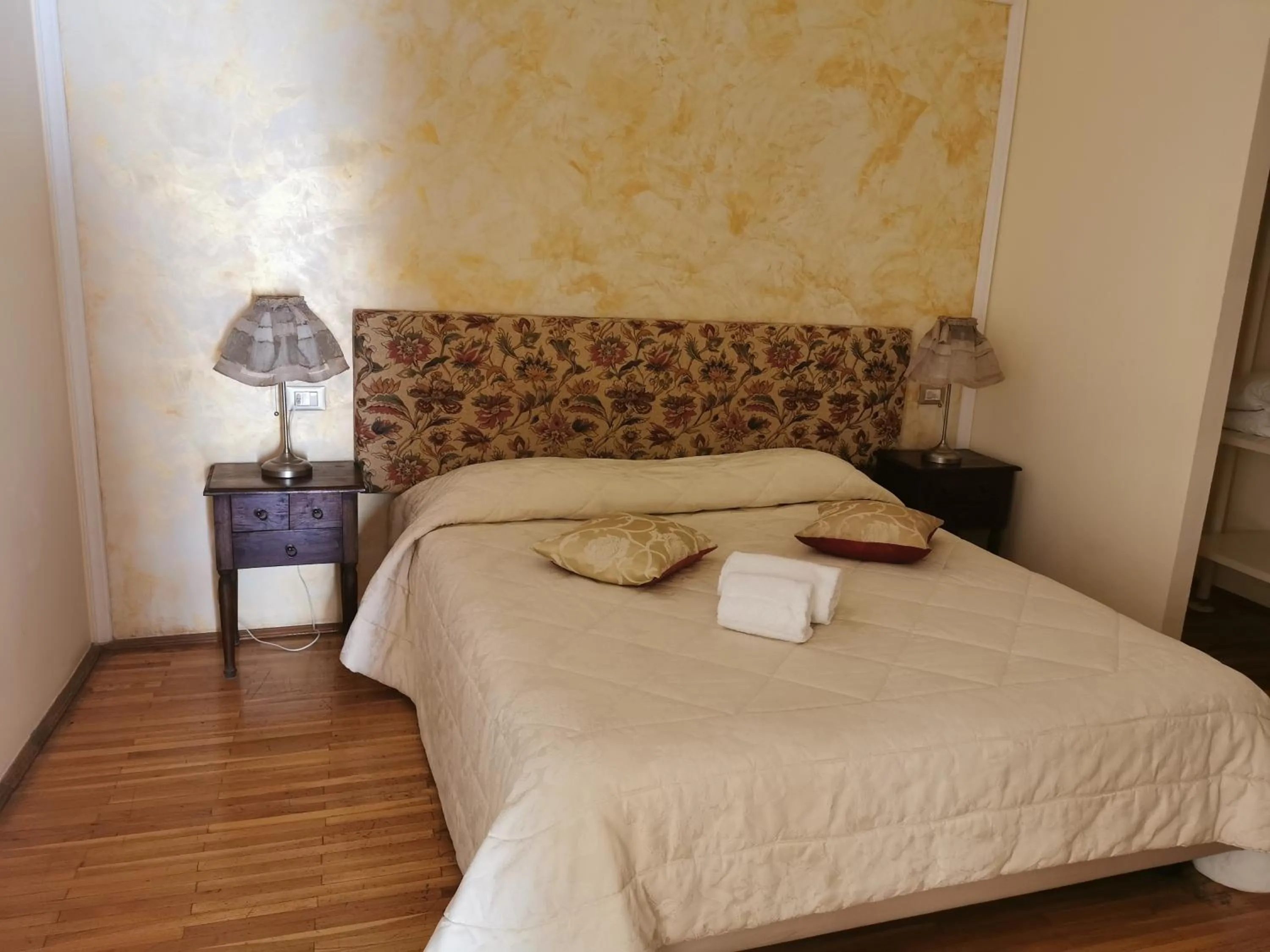 Bed in Prince Residence Apartments