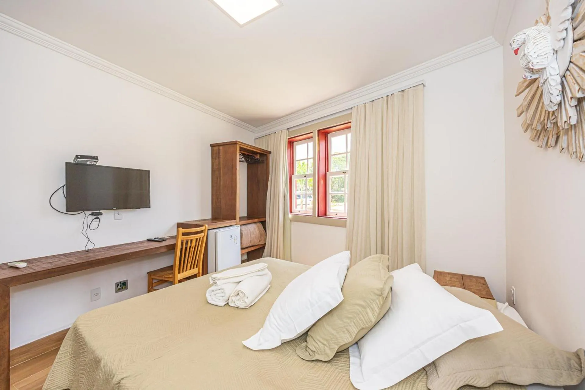 Bed in Pousada Tiradentes