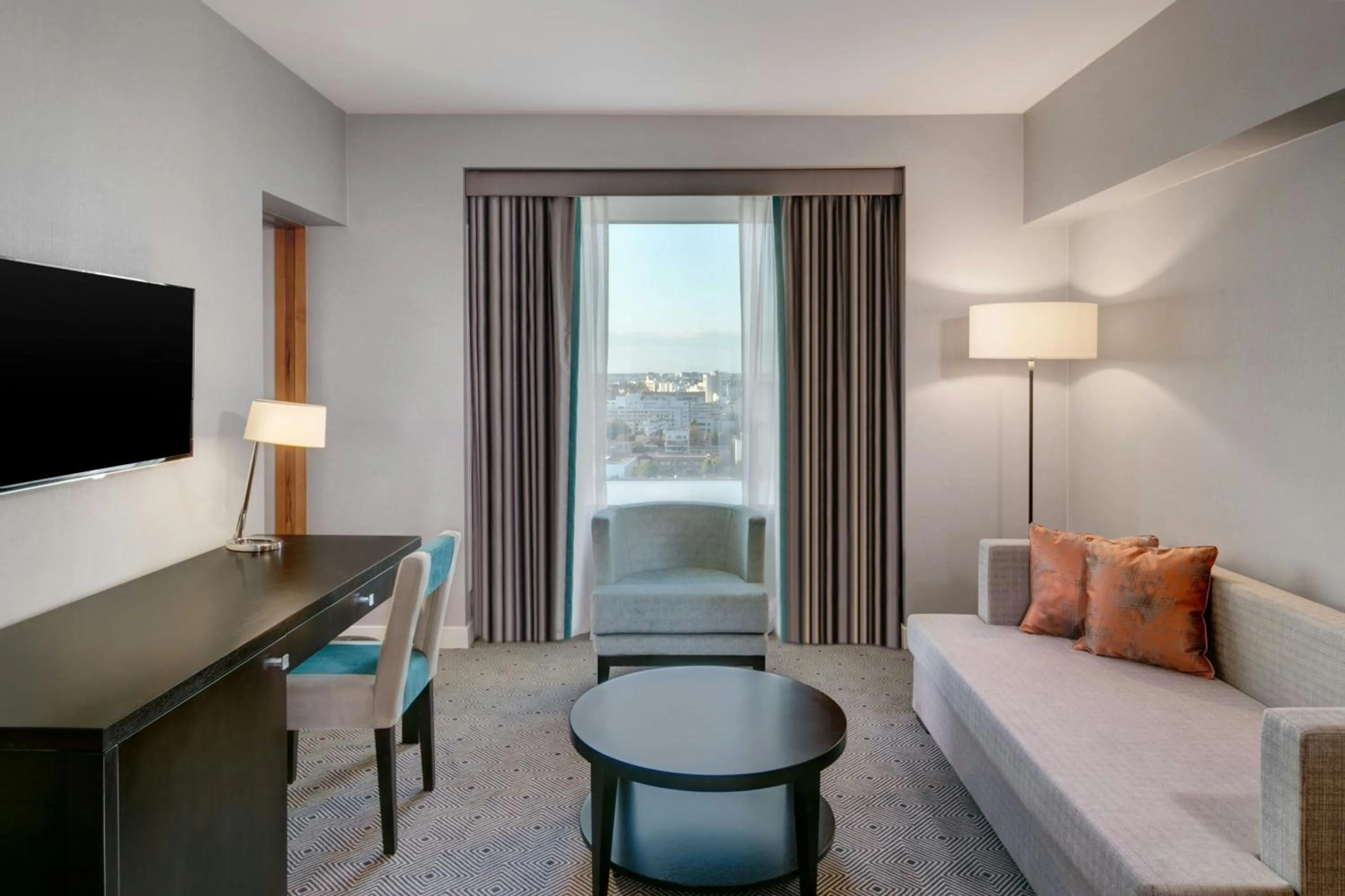 Living room, Bed in Sheraton Bucharest Hotel