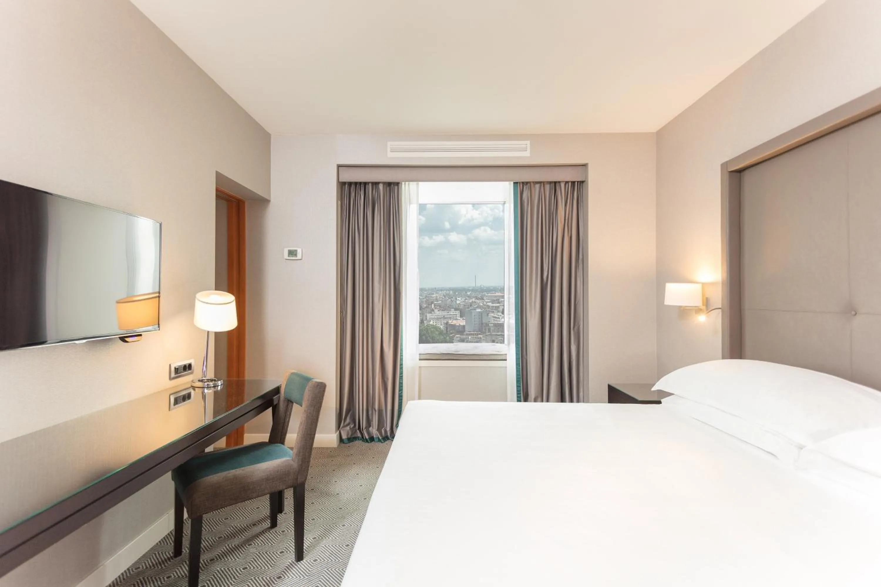 Photo of the whole room, Bed in Sheraton Bucharest Hotel