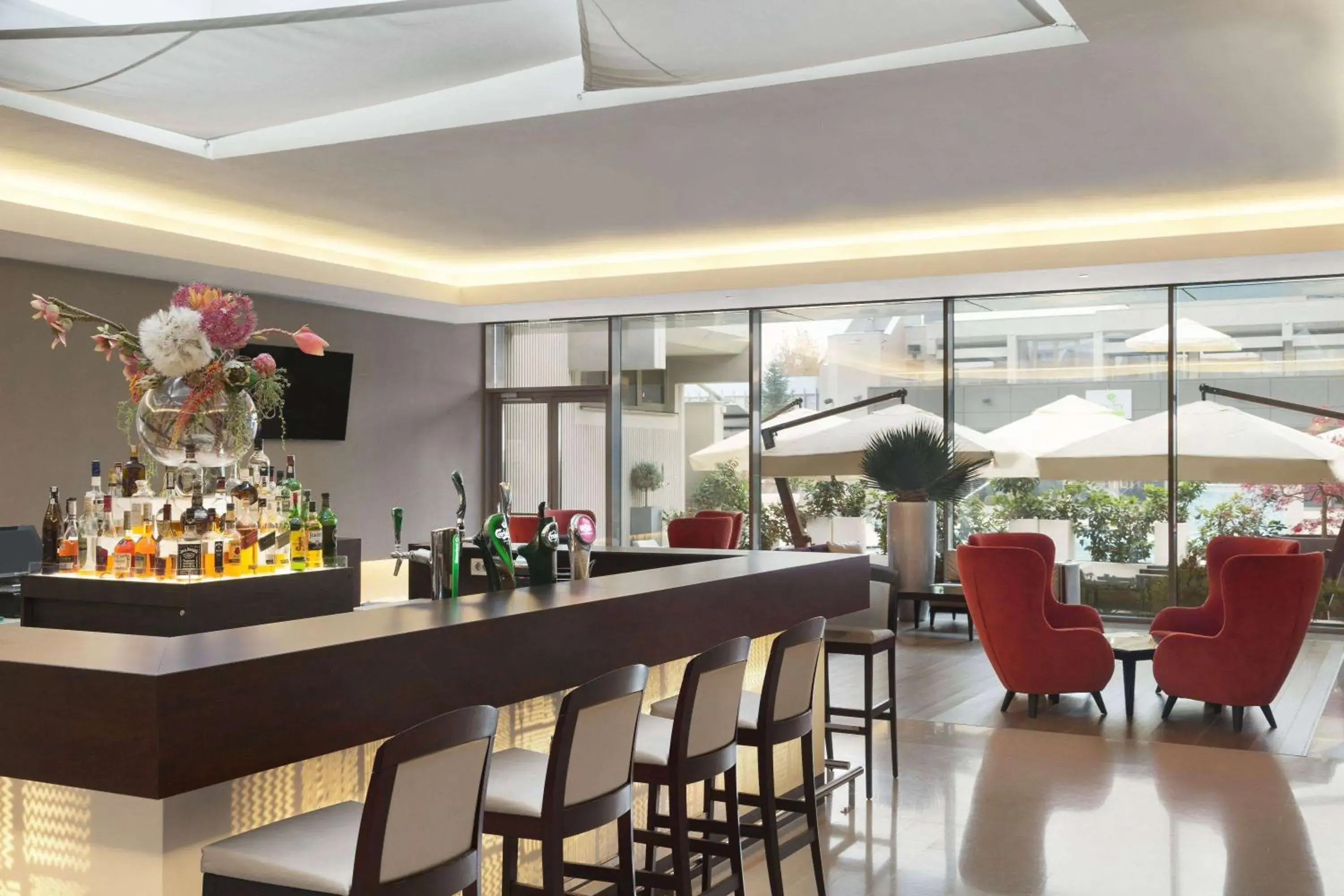 Lounge or bar in Ramada by Wyndham Bucharest Parc Hotel Lounge or bar in Ramada by Wyndham Bucharest Parc Hotel