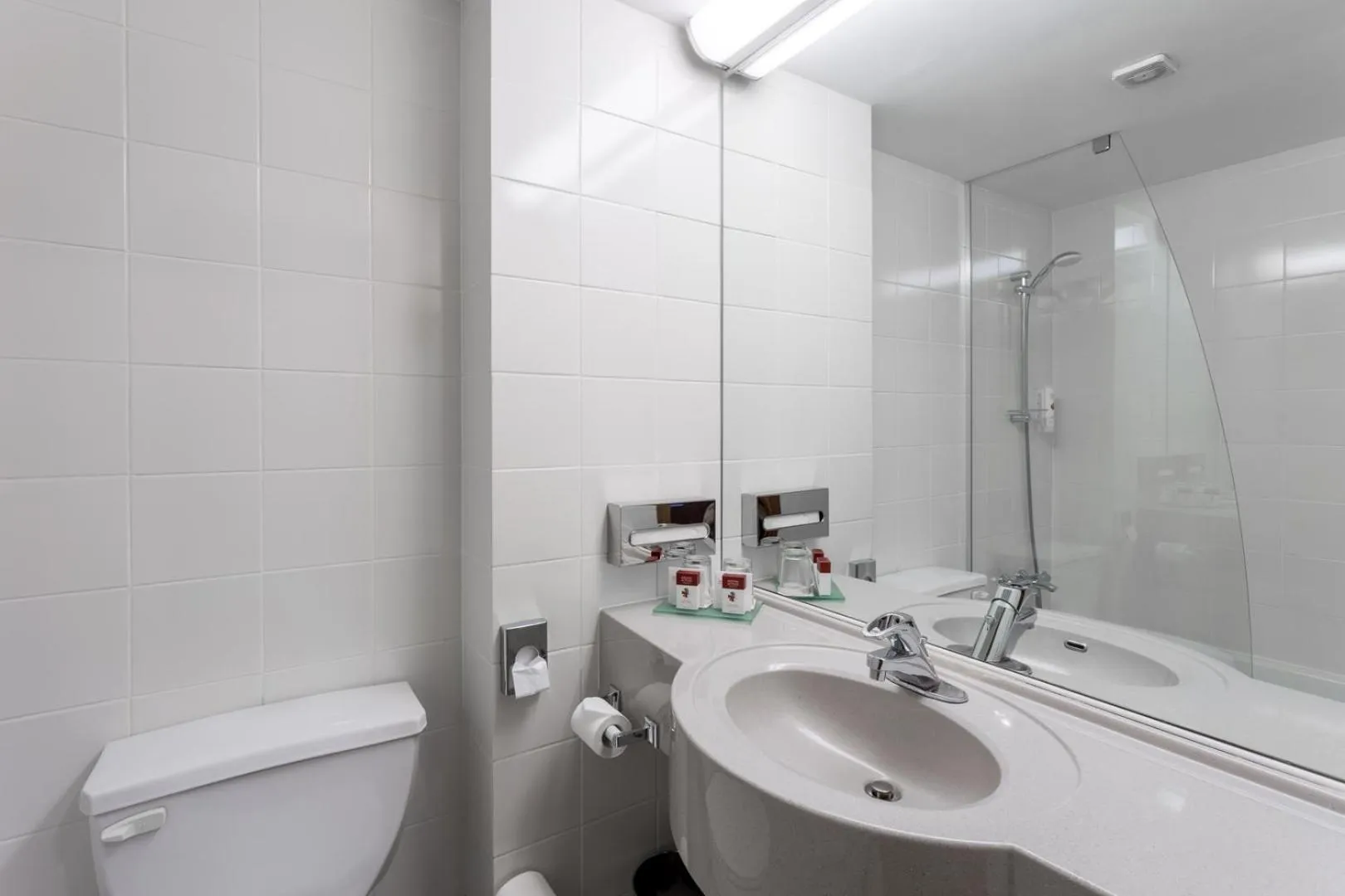 Bathroom in Ramada by Wyndham Bucharest Parc Hotel
