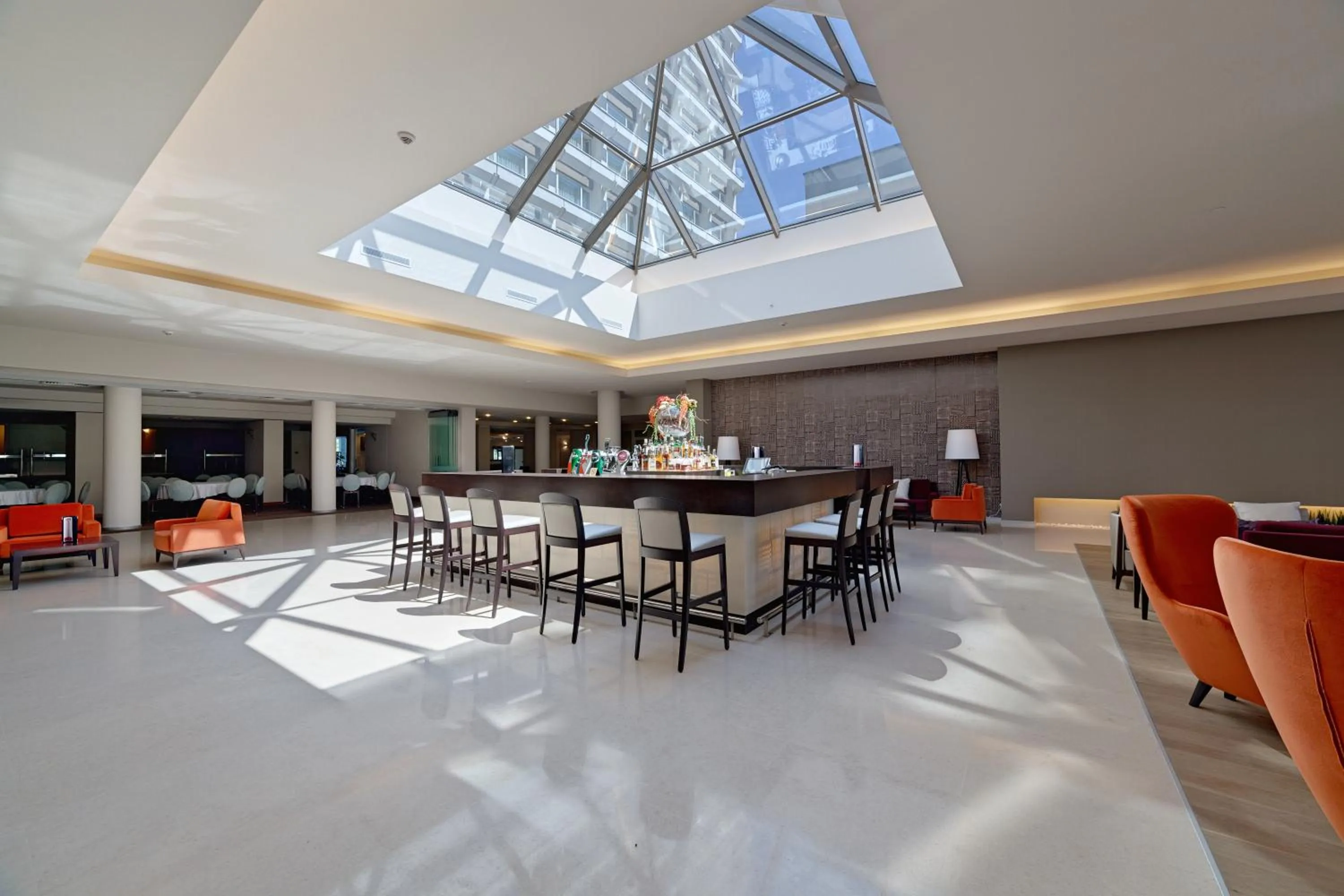 Lounge or bar in Ramada by Wyndham Bucharest Parc Hotel