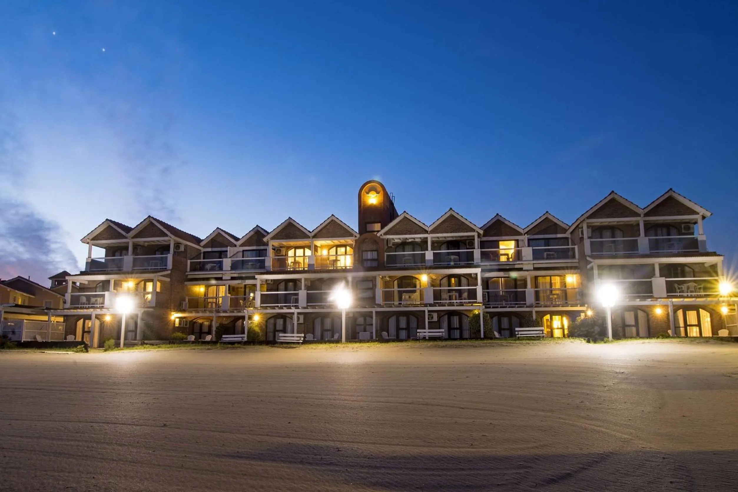 Facade/entrance in Carilo Soleil By HS