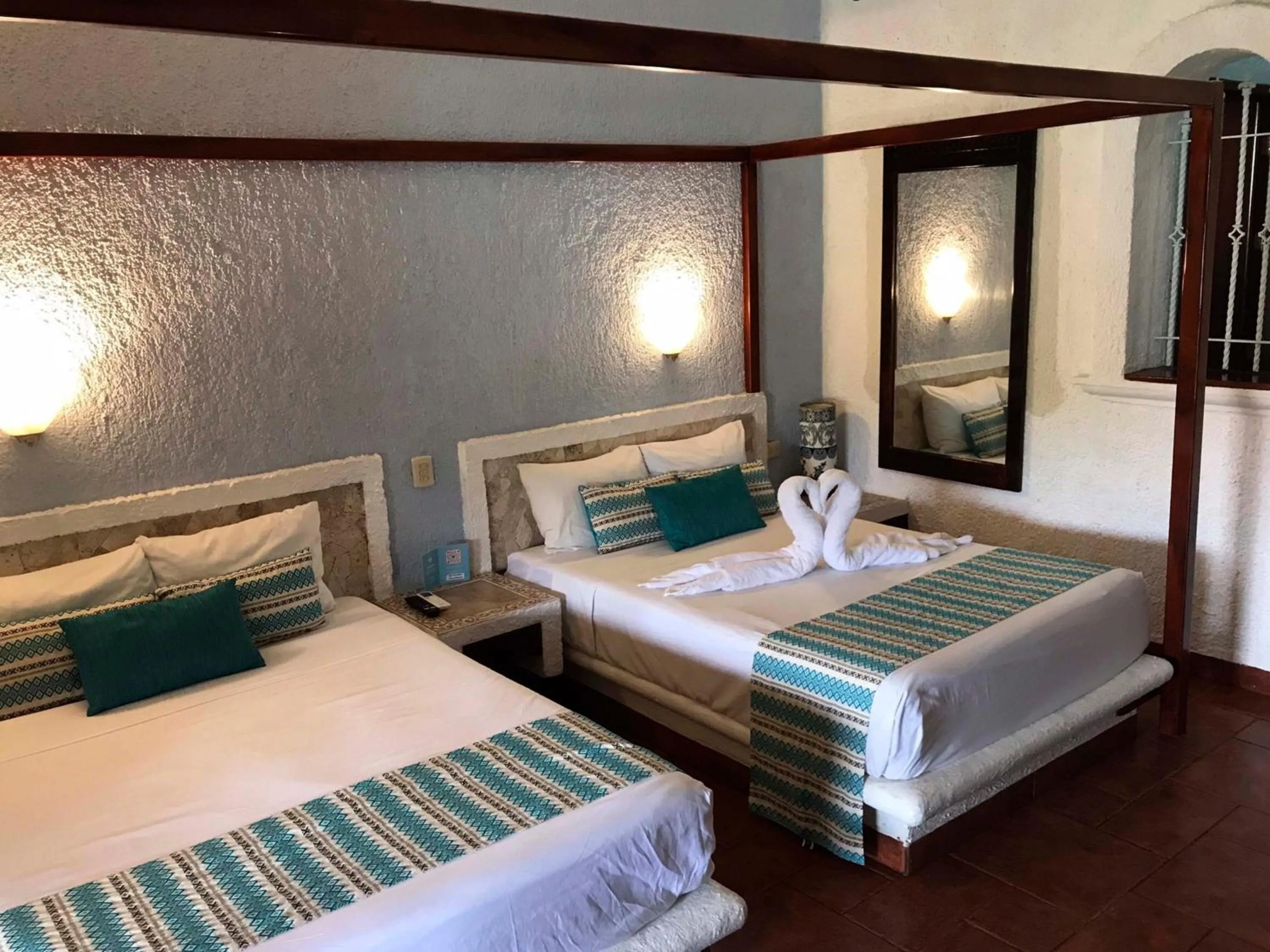 Bed in Chez Waffle Hotel