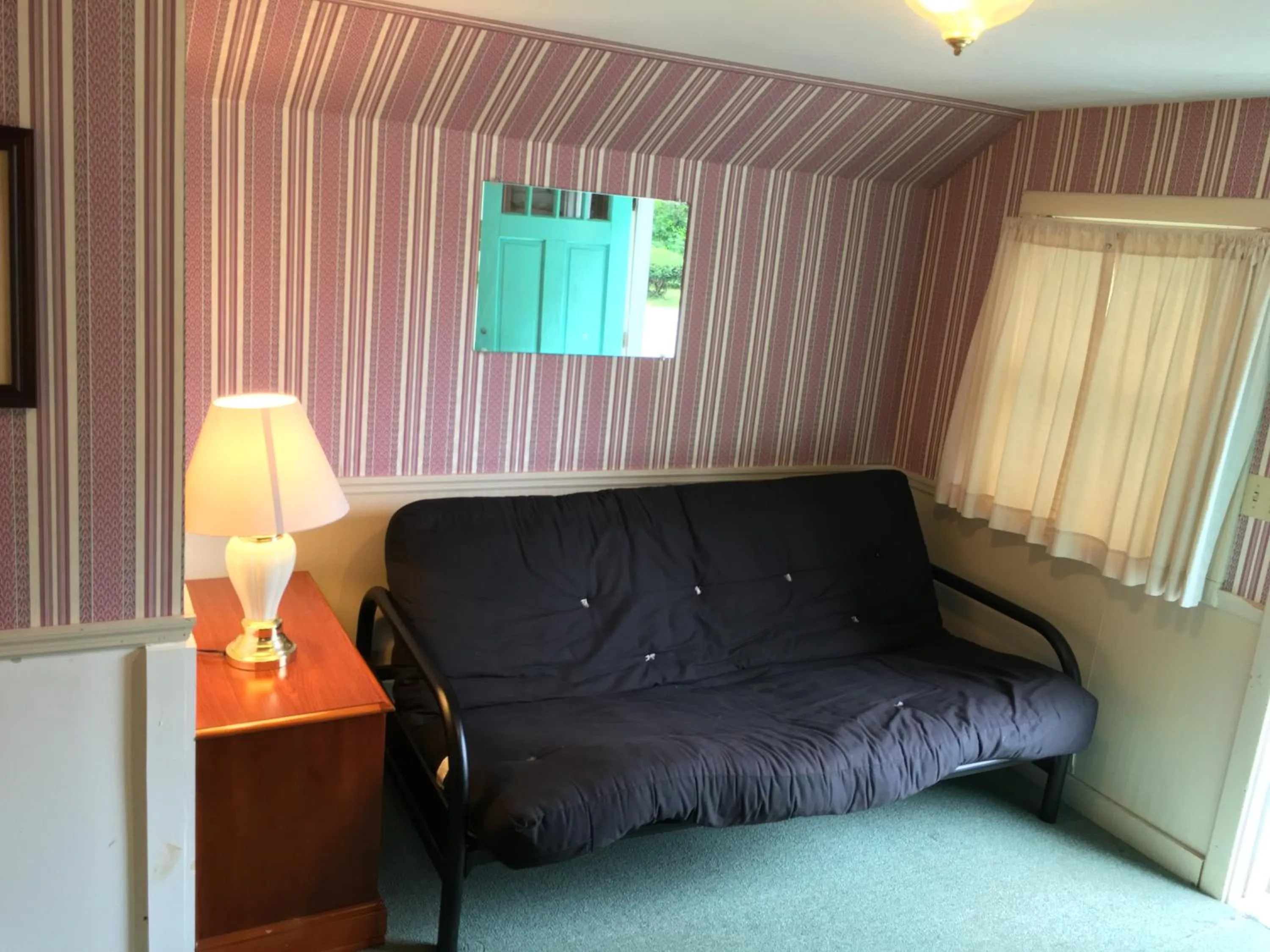 Living room, Bed in Doray Motel Lake George