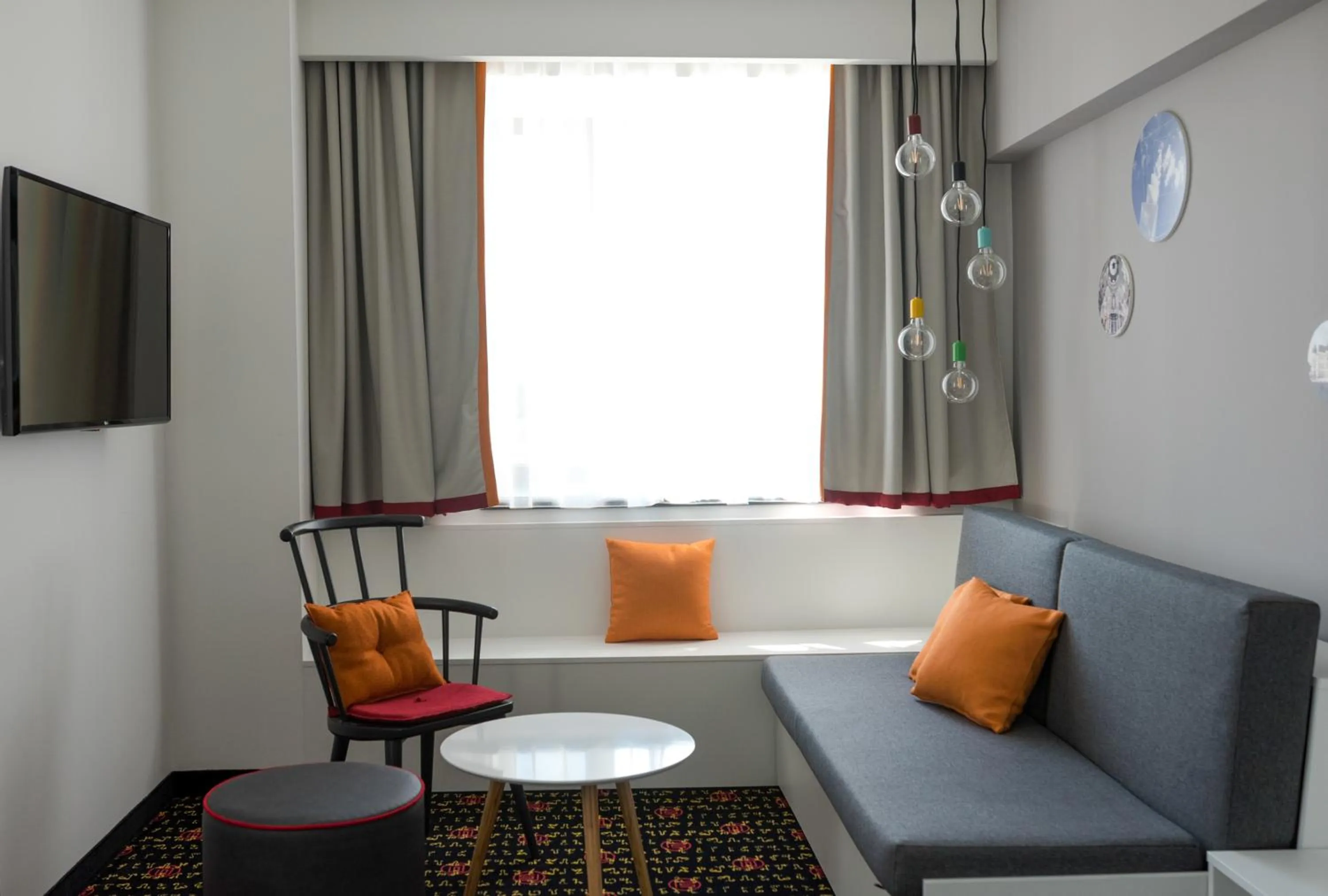 Living room in Vienna House Easy by Wyndham Bucharest Airport