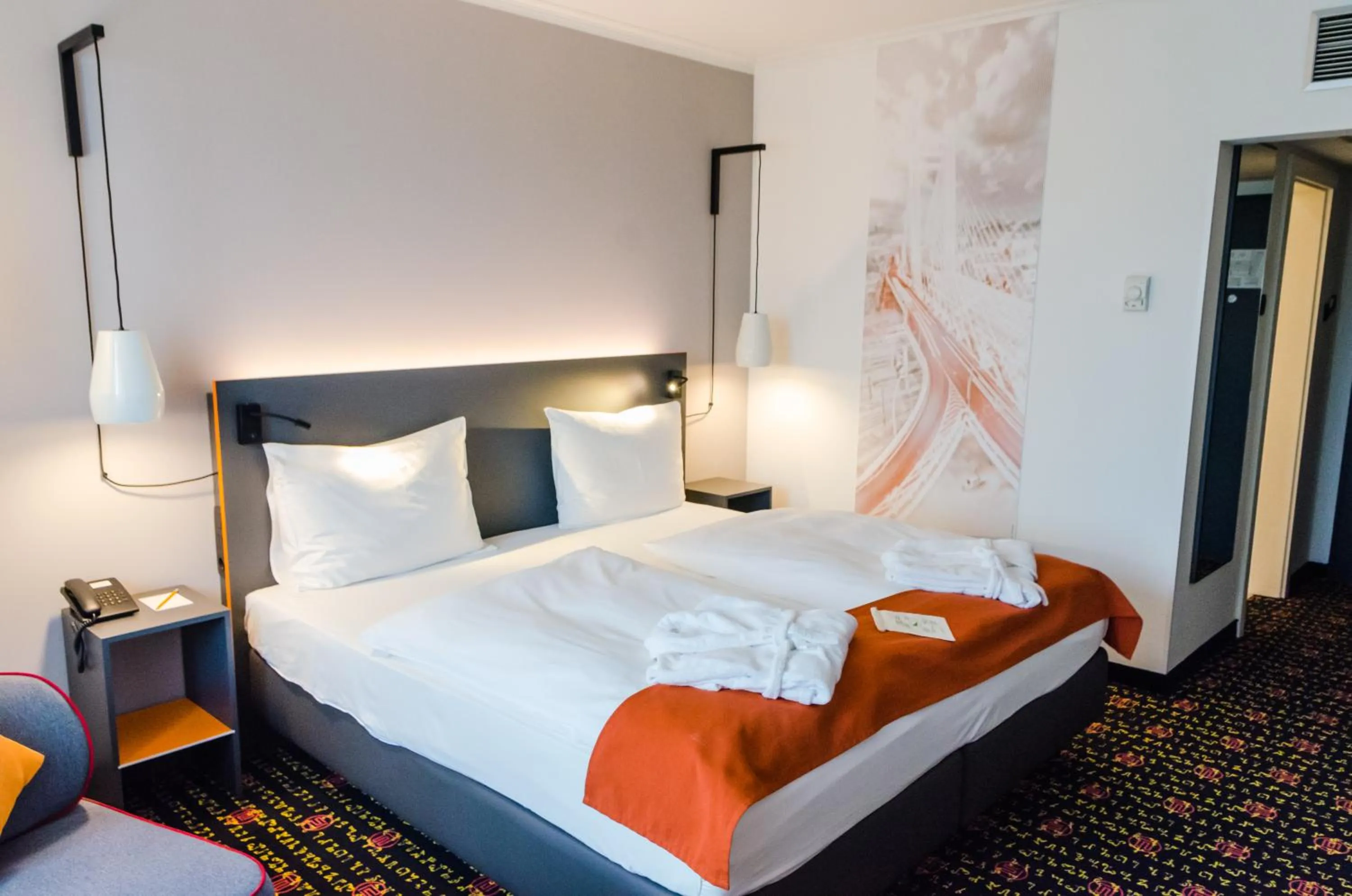 Bed in Vienna House Easy by Wyndham Bucharest Airport