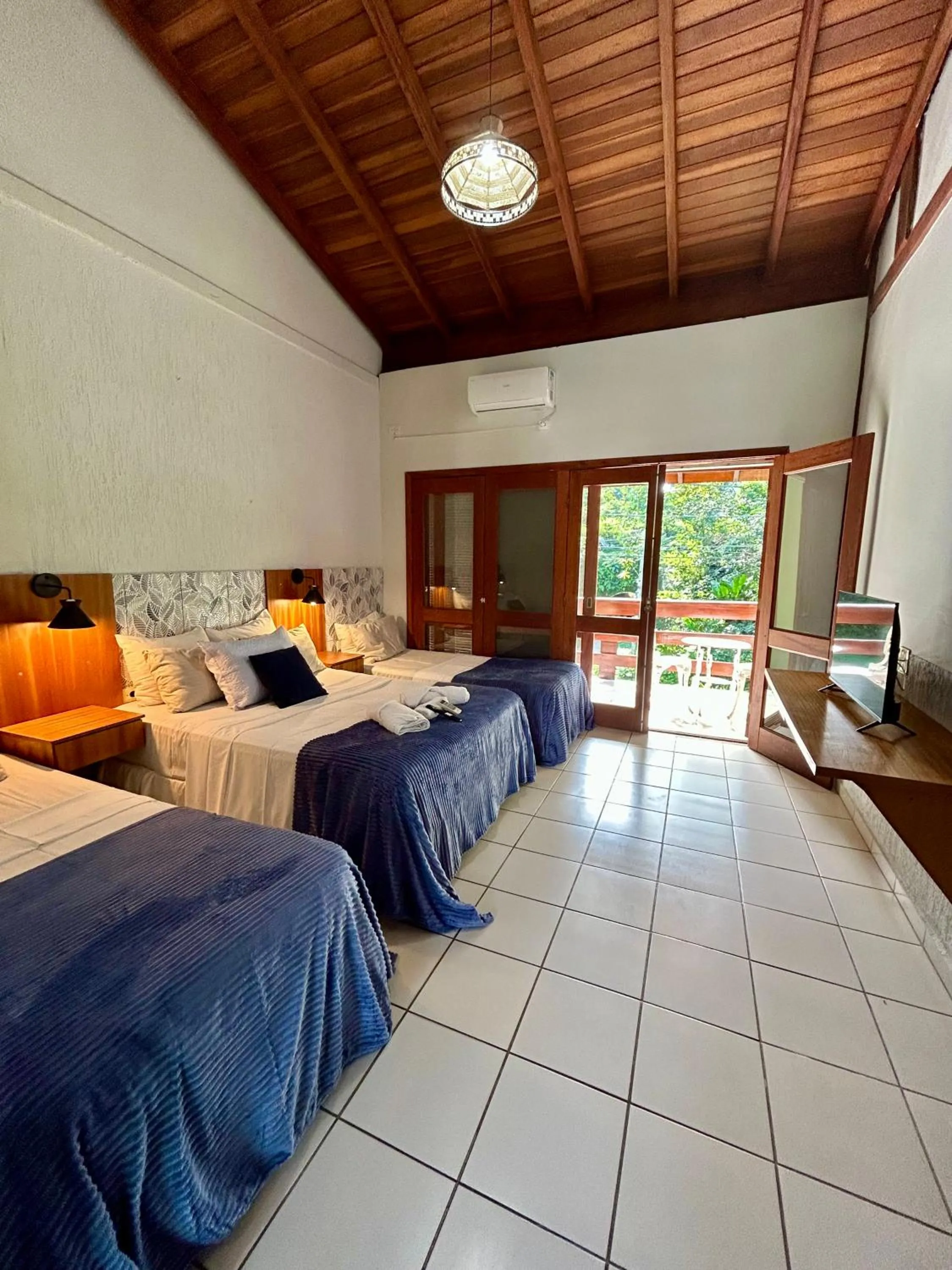 Photo of the whole room, Bed in Recanto Verde Praia Hotel Juquehy