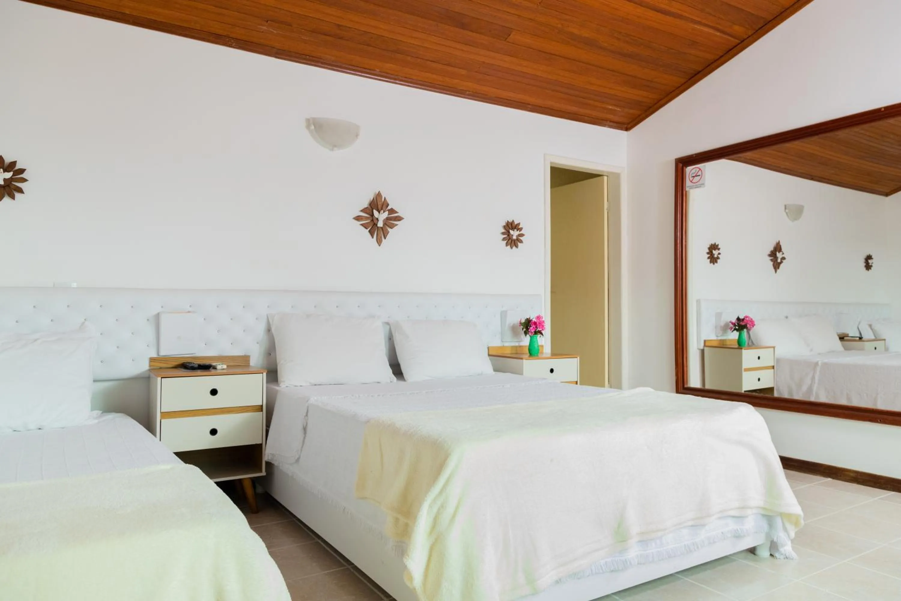 Bed in Pousada Brilho da Serra