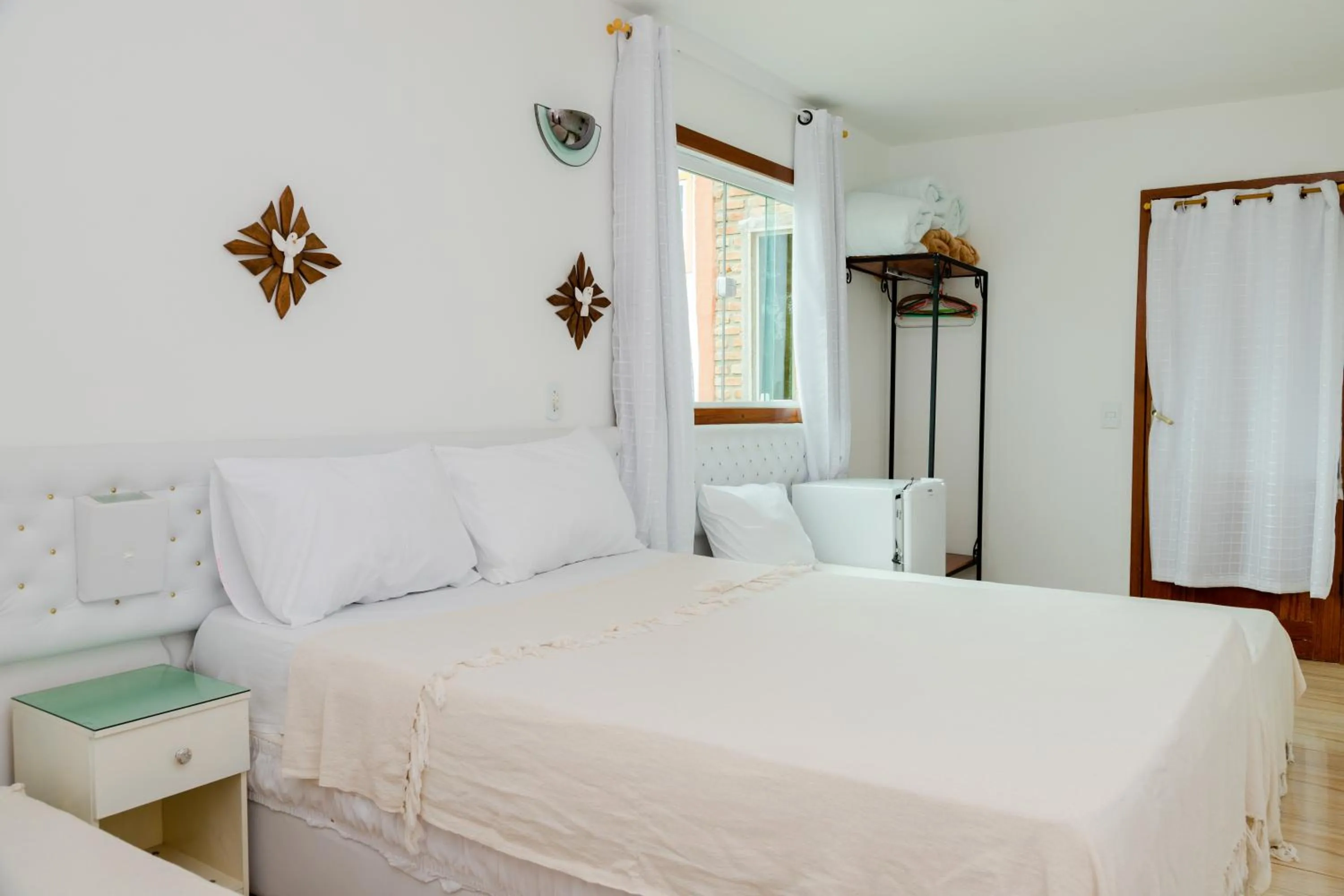 Bed in Pousada Brilho da Serra