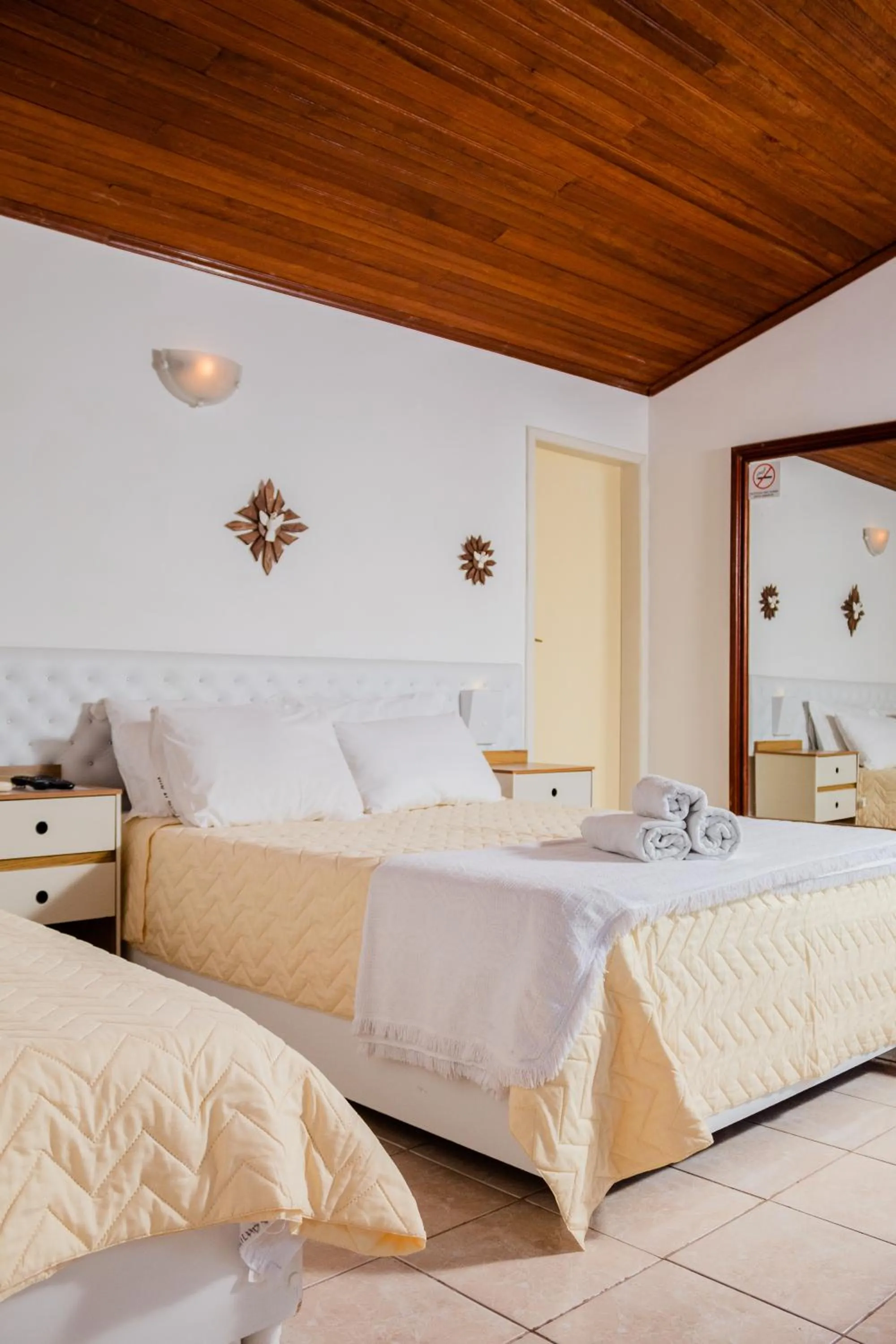 Bed in Pousada Brilho da Serra