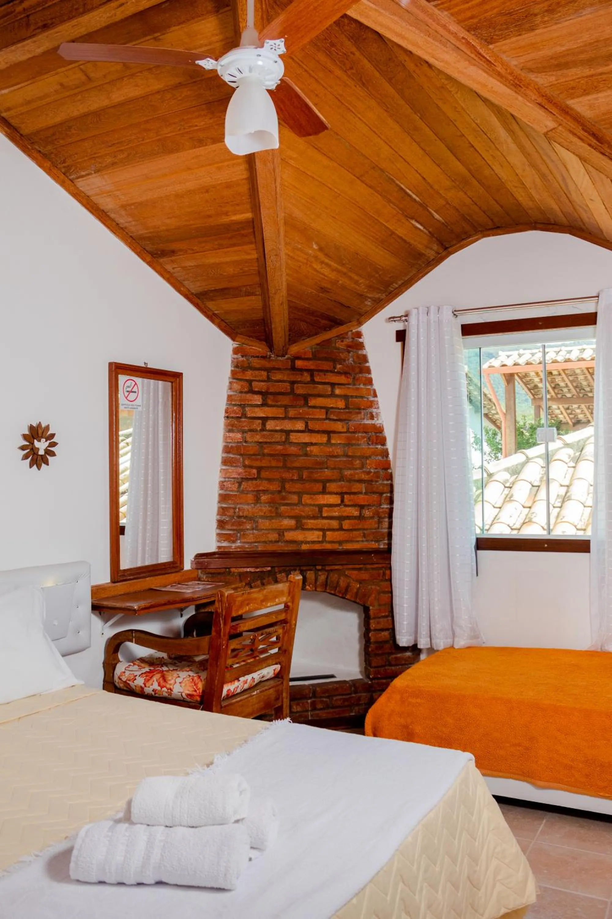 Bed in Pousada Brilho da Serra