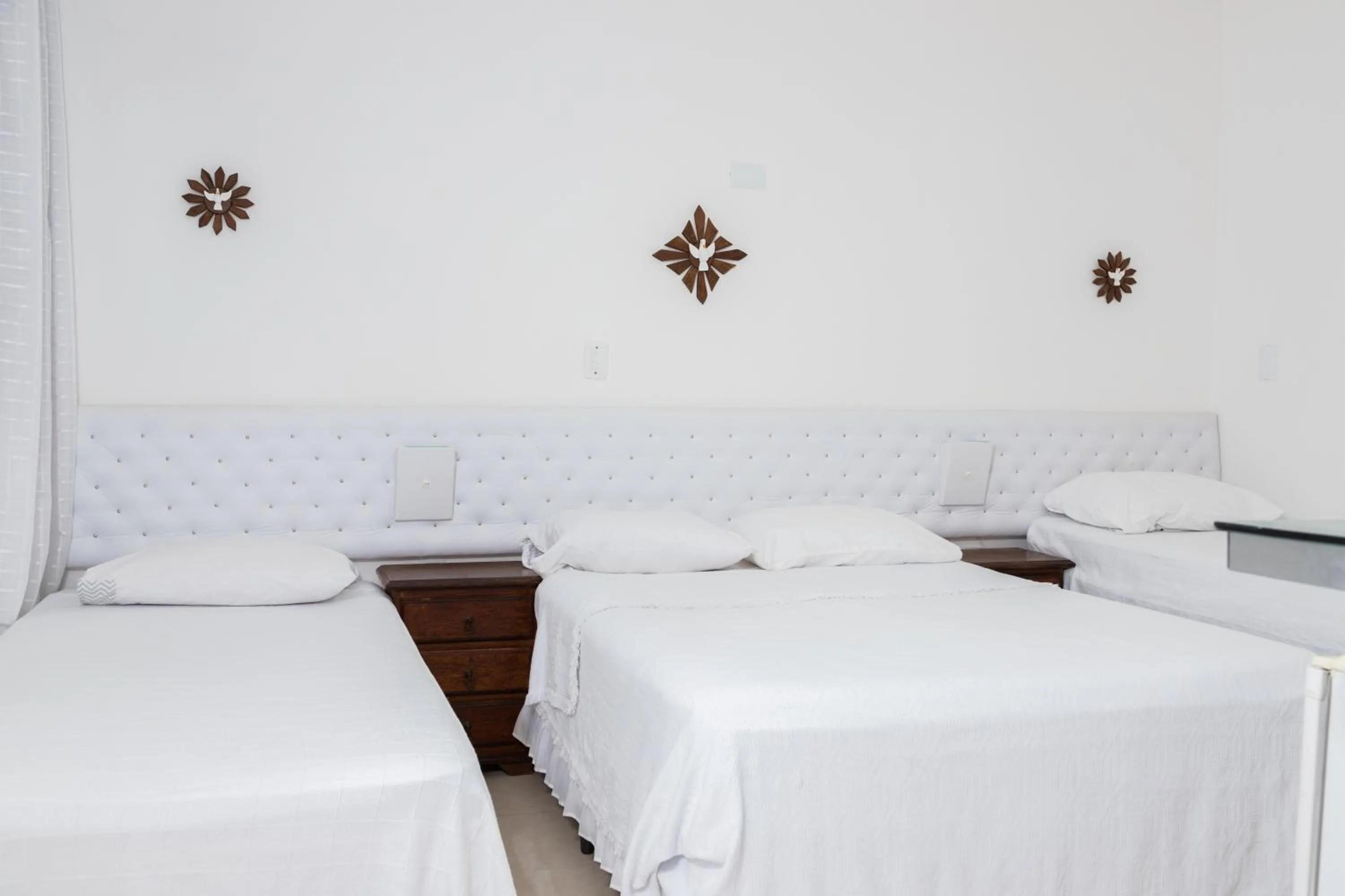 Bed in Pousada Brilho da Serra