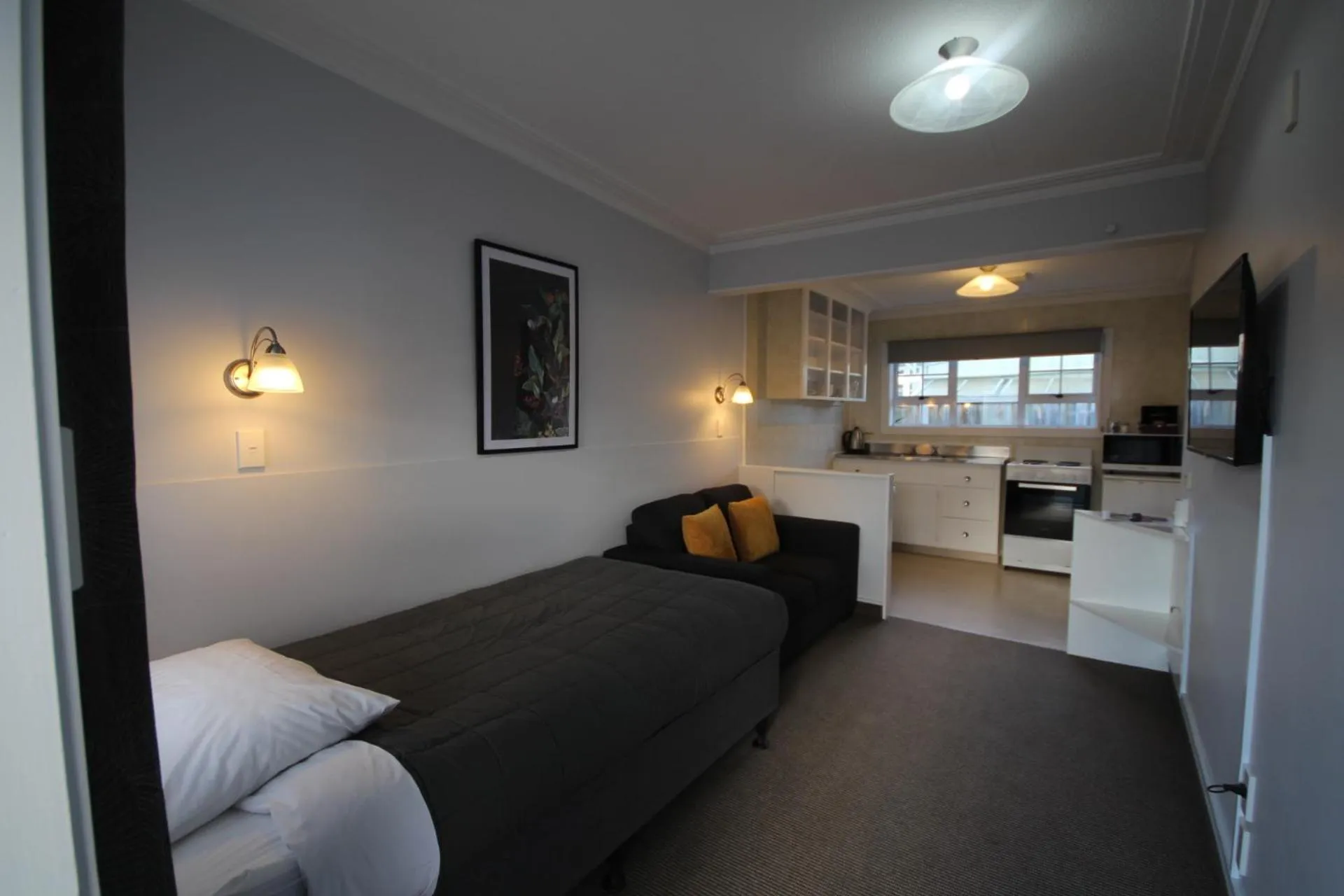 Bed in Beach Lodge Motels