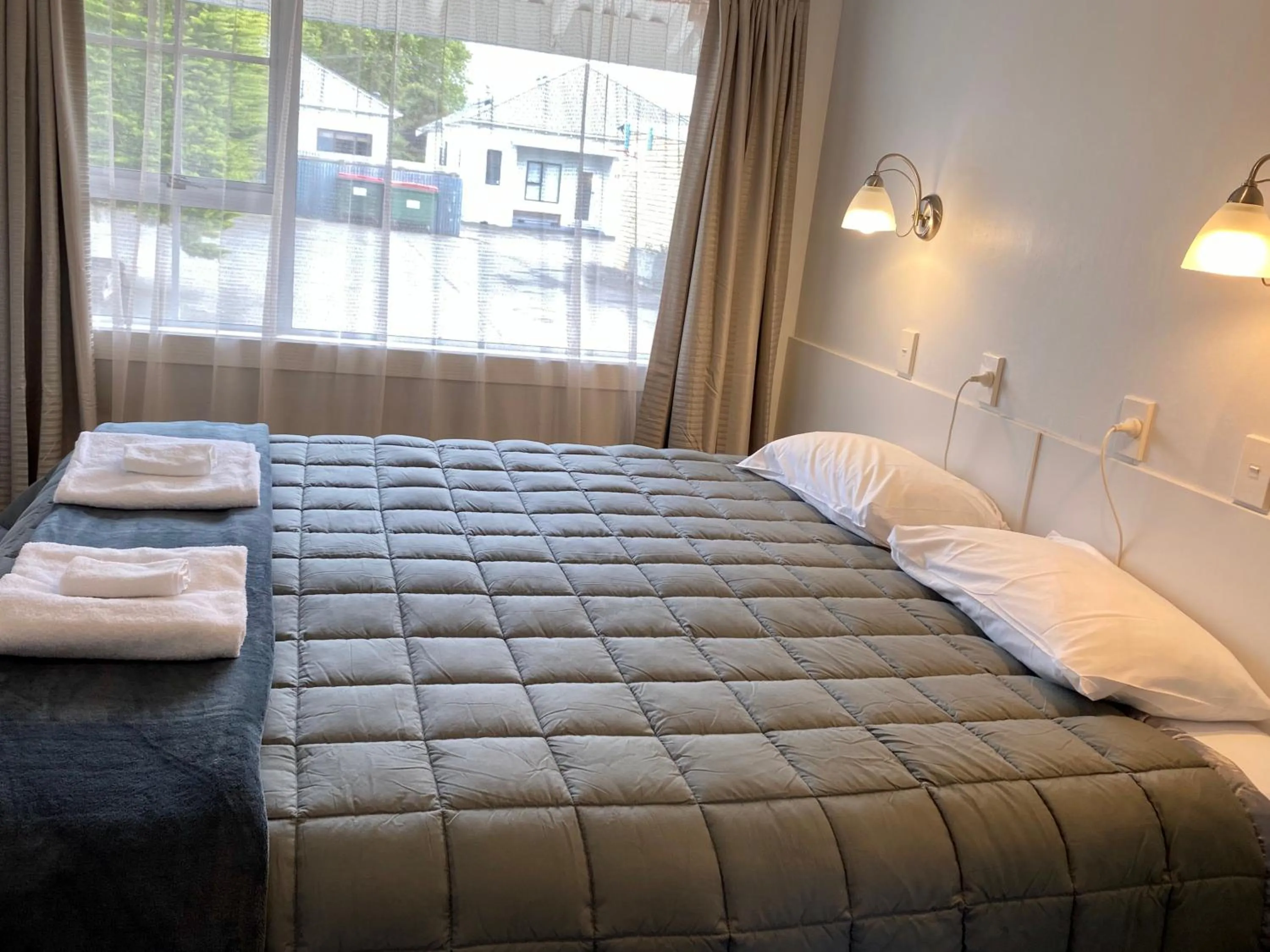 Bed in Beach Lodge Motels