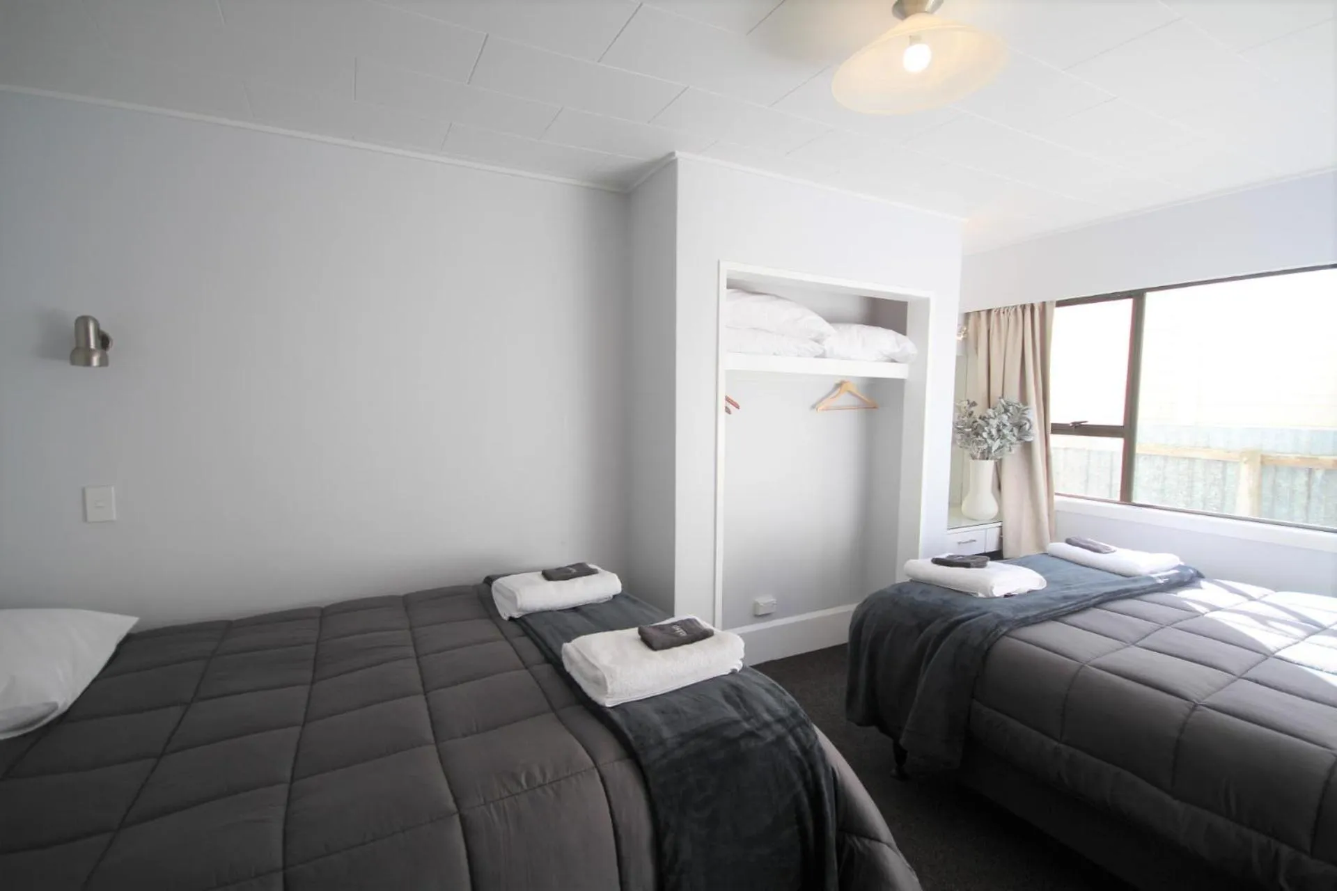 Bed in Beach Lodge Motels