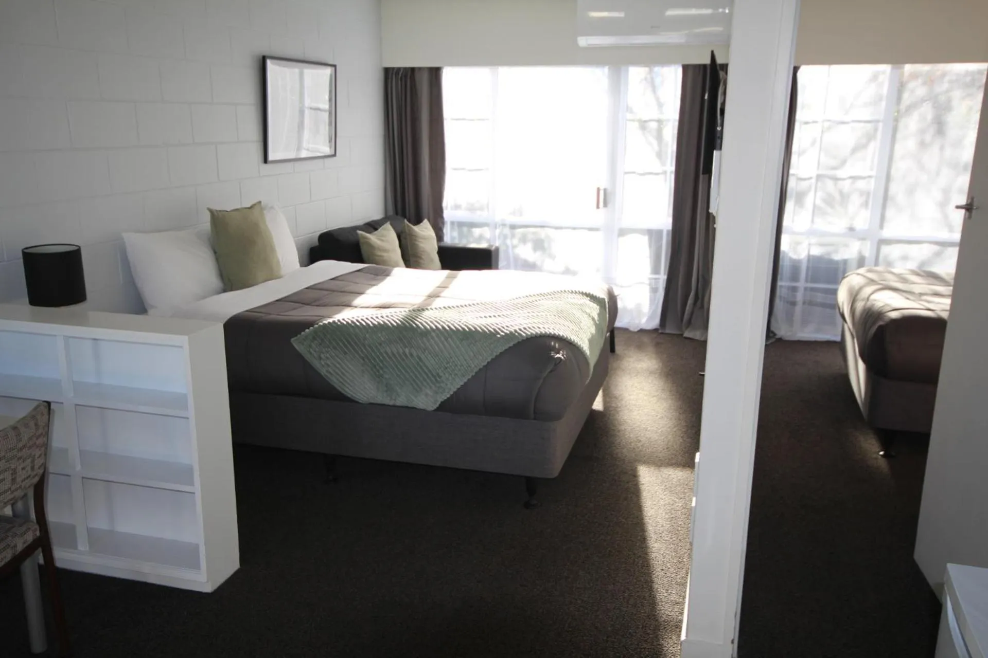 Bed in Beach Lodge Motels