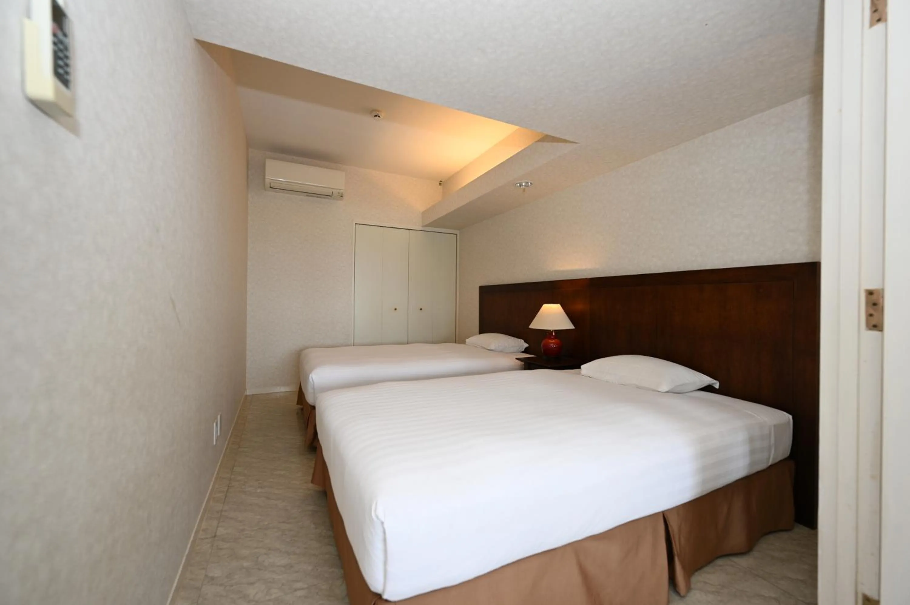 Bed in Hotel Royal Marine Palace Ishigakijima