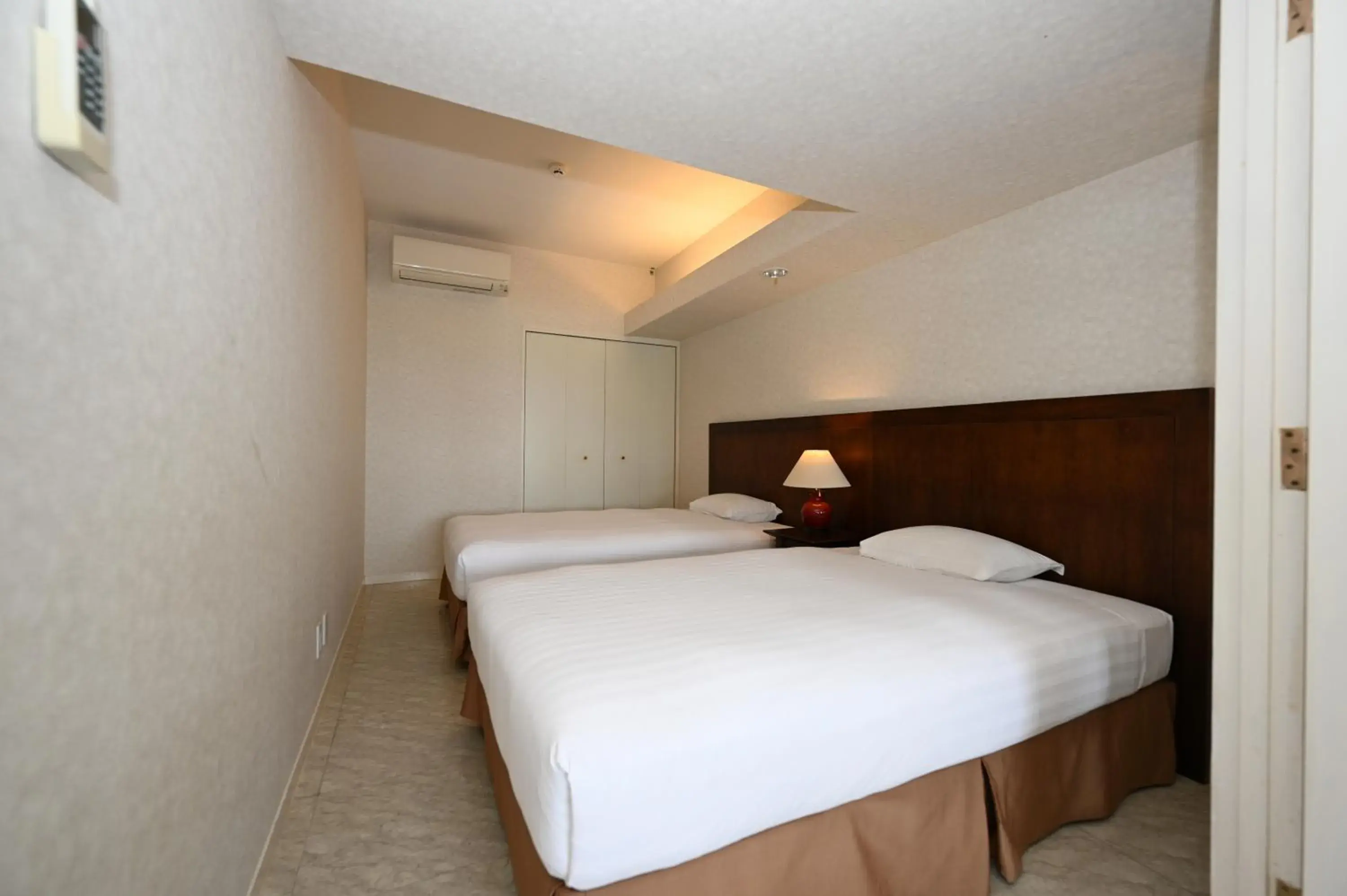 Bed in Hotel Royal Marine Palace Ishigakijima Bed in Hotel Royal Marine Palace Ishigakijima