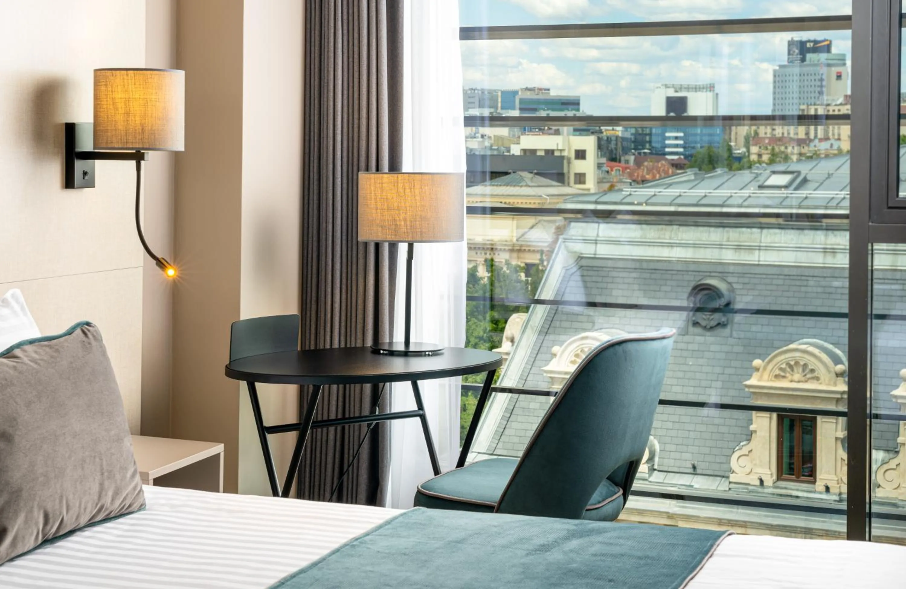 Seating area, Bed in Leonardo Hotel Bucharest City Center