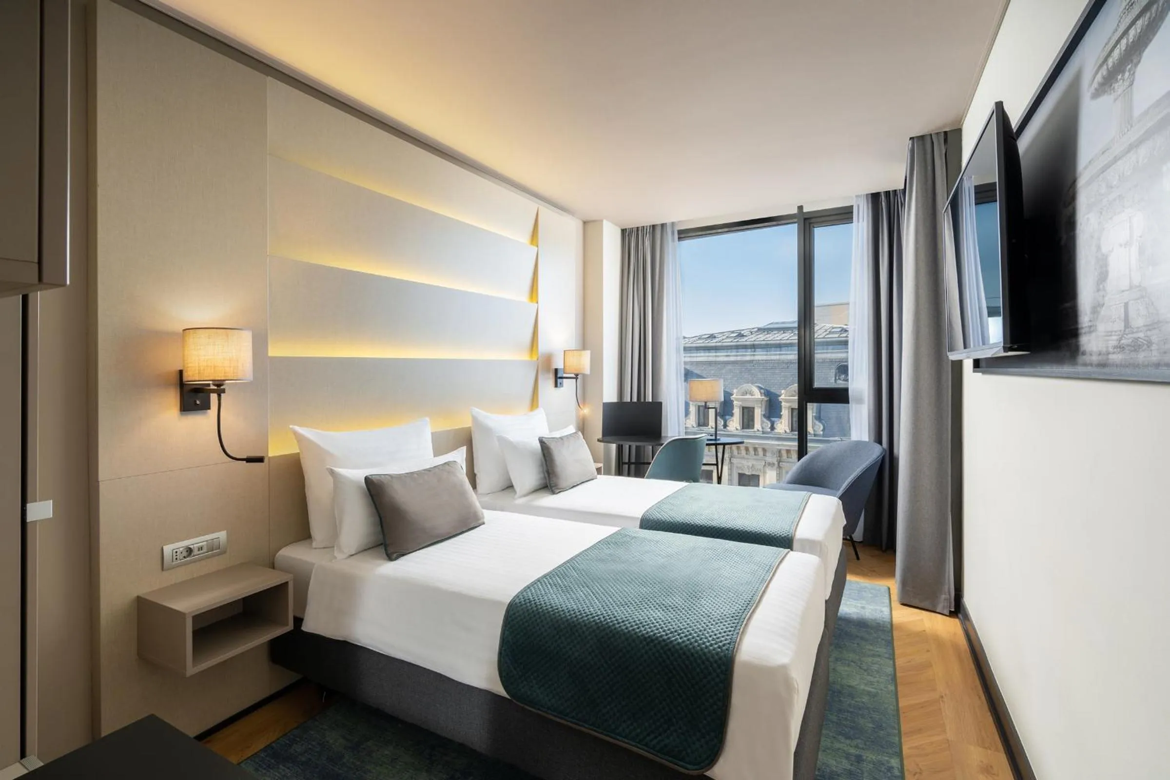 Bed in Leonardo Hotel Bucharest City Center