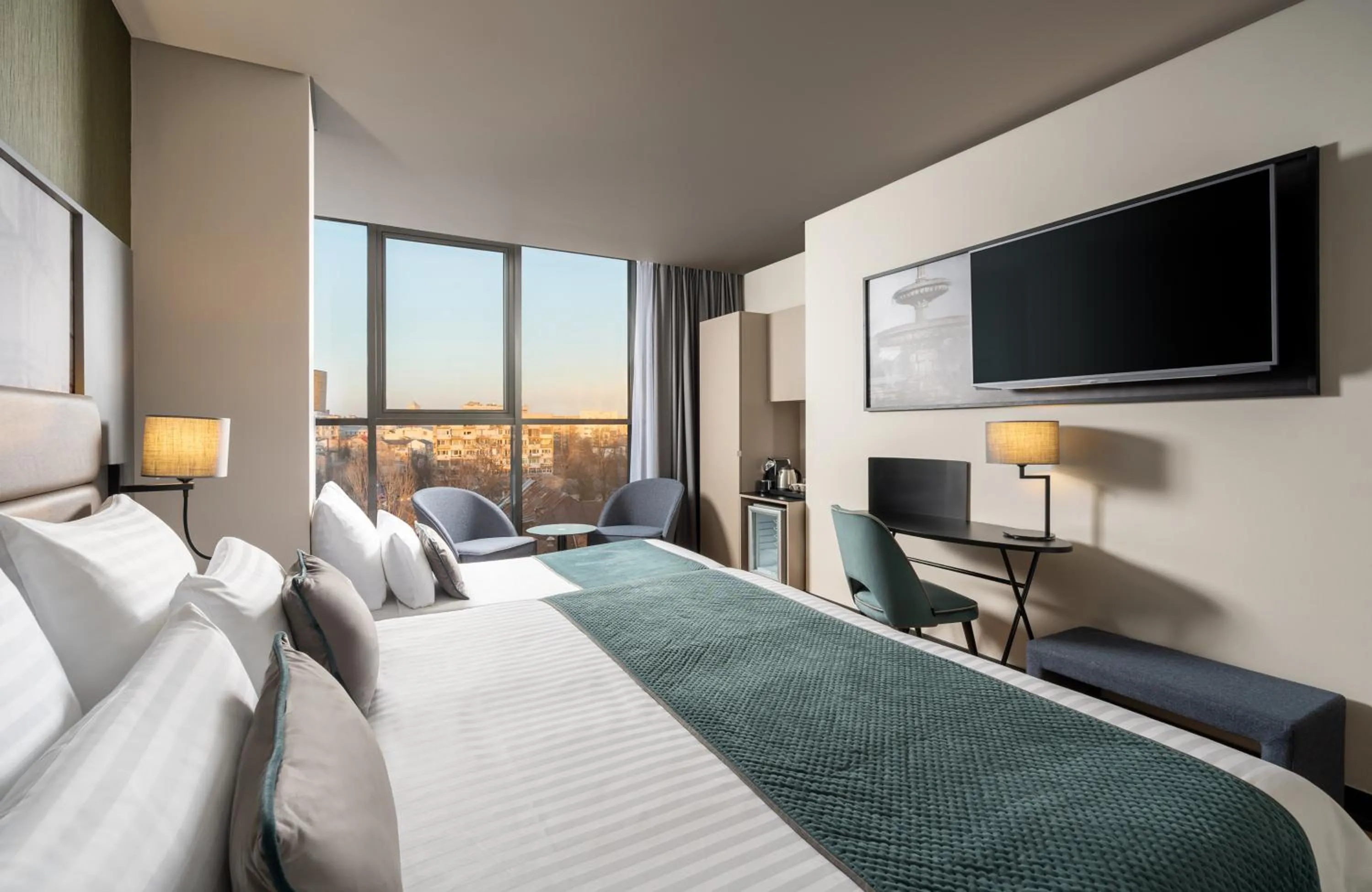 Bed in Leonardo Hotel Bucharest City Center