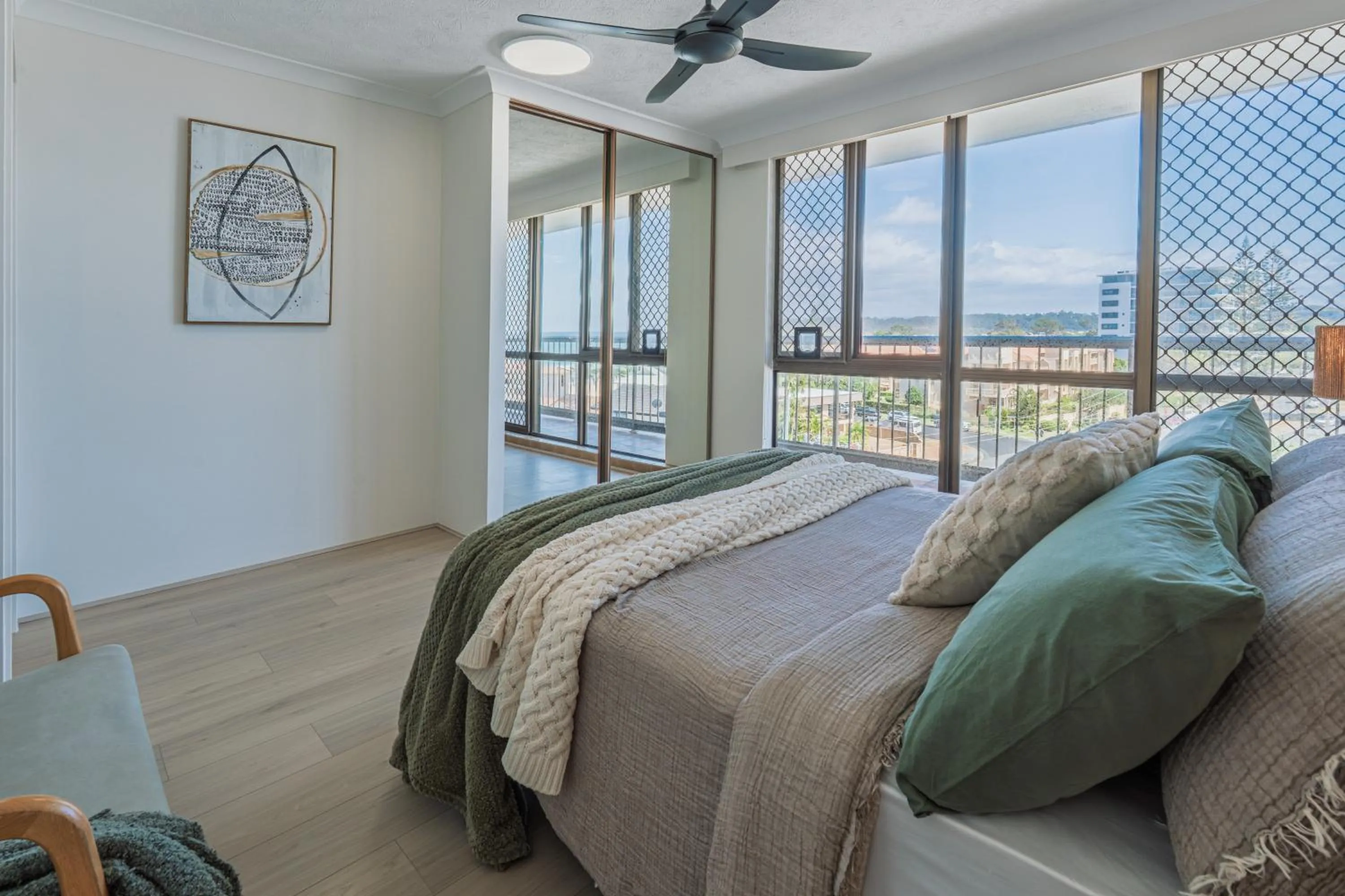 Bed in Beach Palms Holiday Apartments