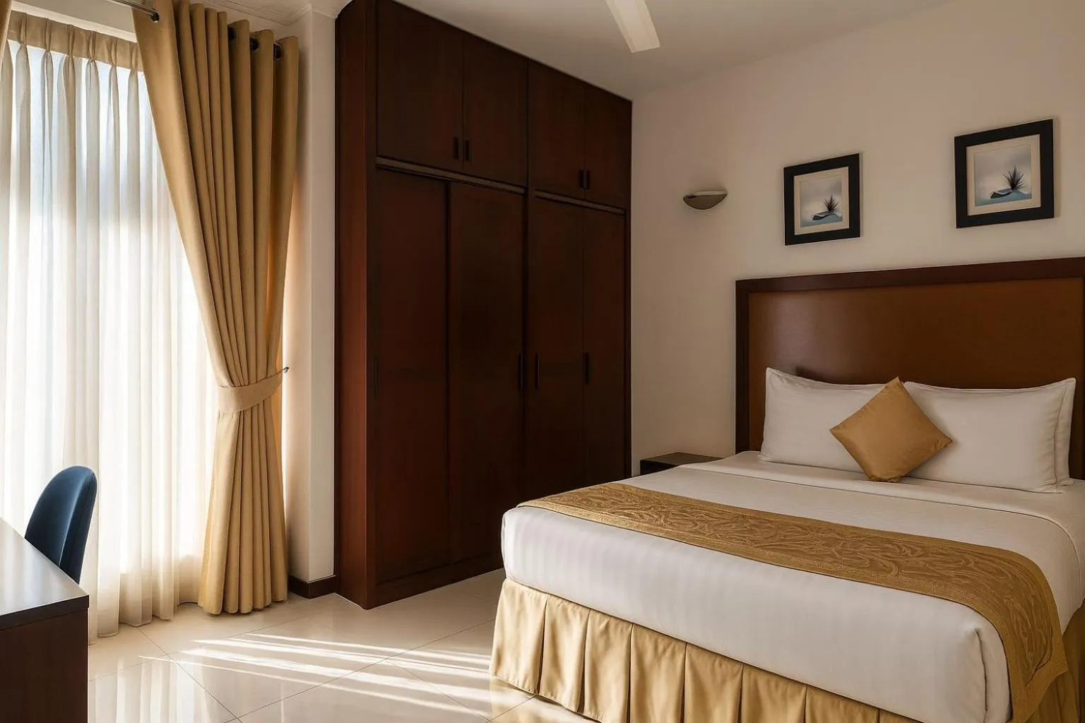 Bed in Unique Towers Luxury Boutique Suites