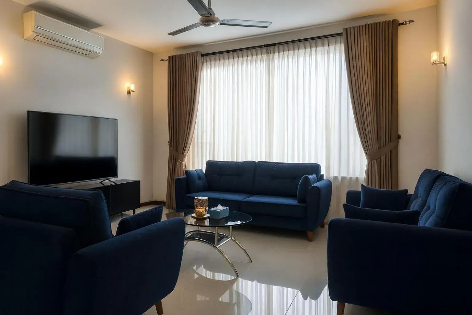 Living room in Unique Towers Luxury Boutique Suites Living room in Unique Towers Luxury Boutique Suites