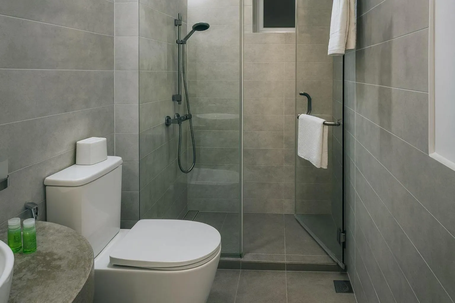 Toilet in Unique Towers Luxury Boutique Suites