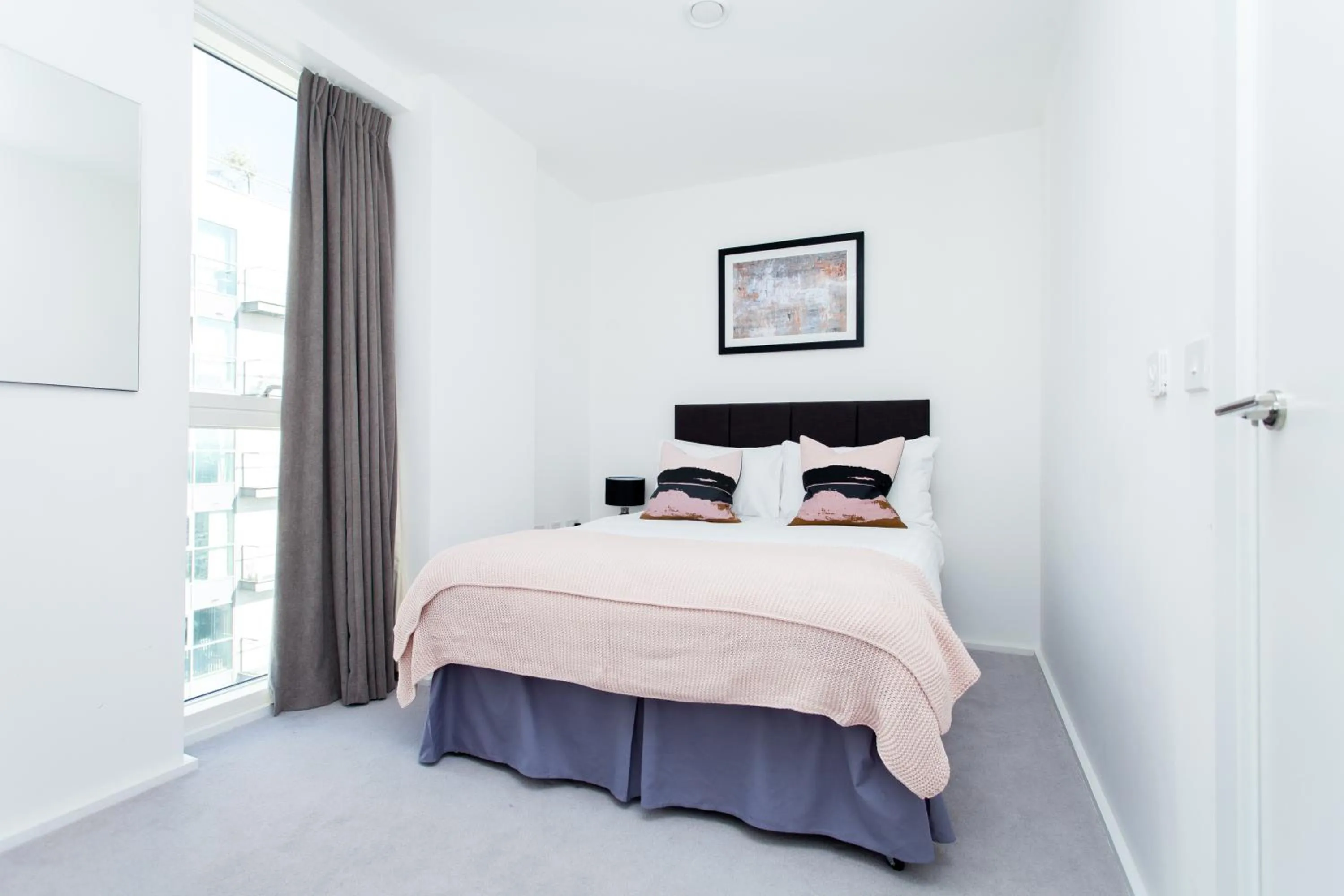 Bed in Clover Court by Aeria Apartments