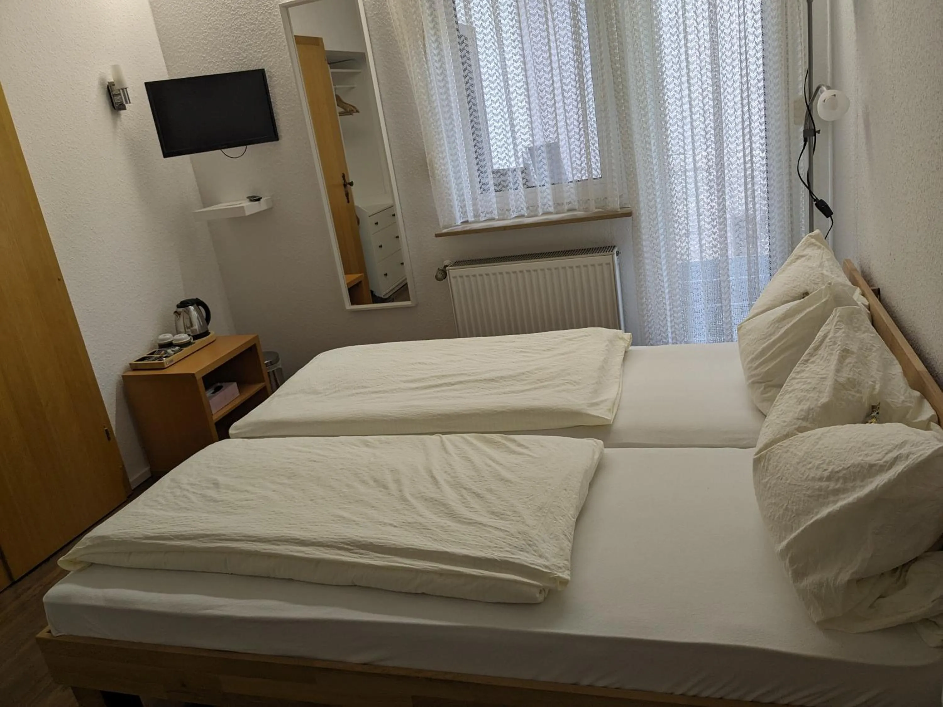Photo of the whole room, Bed in Hotel Pension Winzerhaus