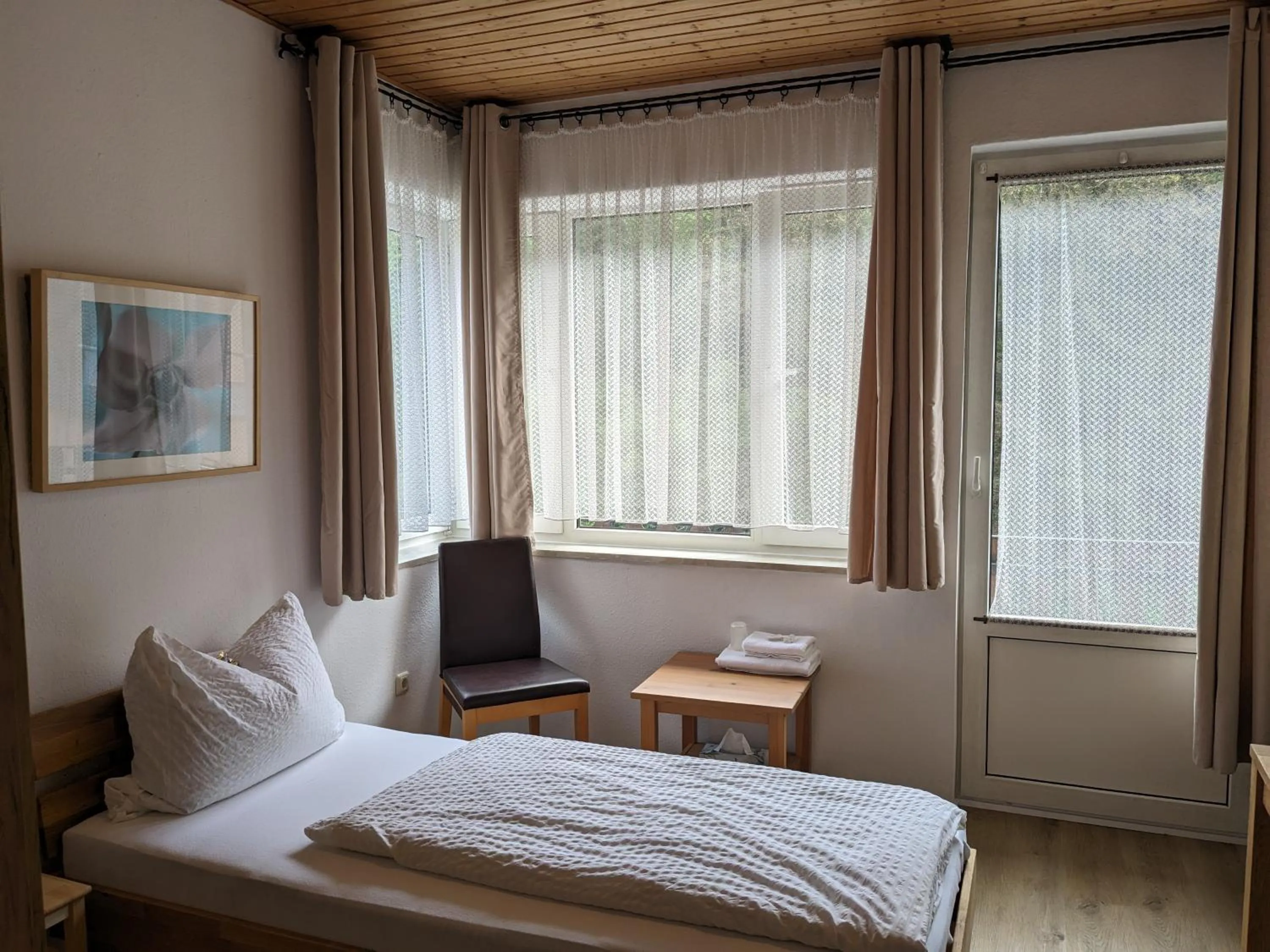 Bed in Hotel Pension Winzerhaus