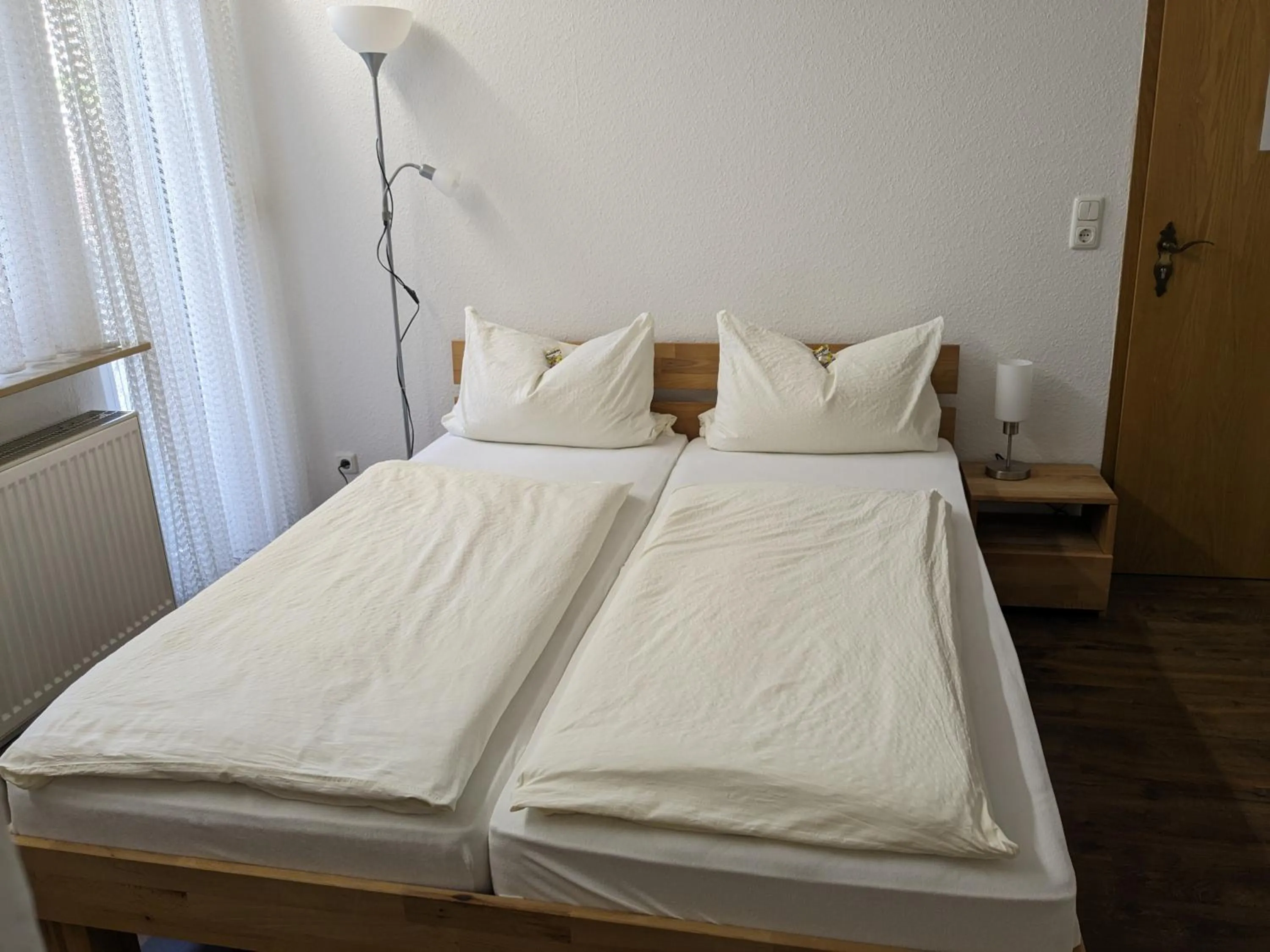 Photo of the whole room, Bed in Hotel Pension Winzerhaus