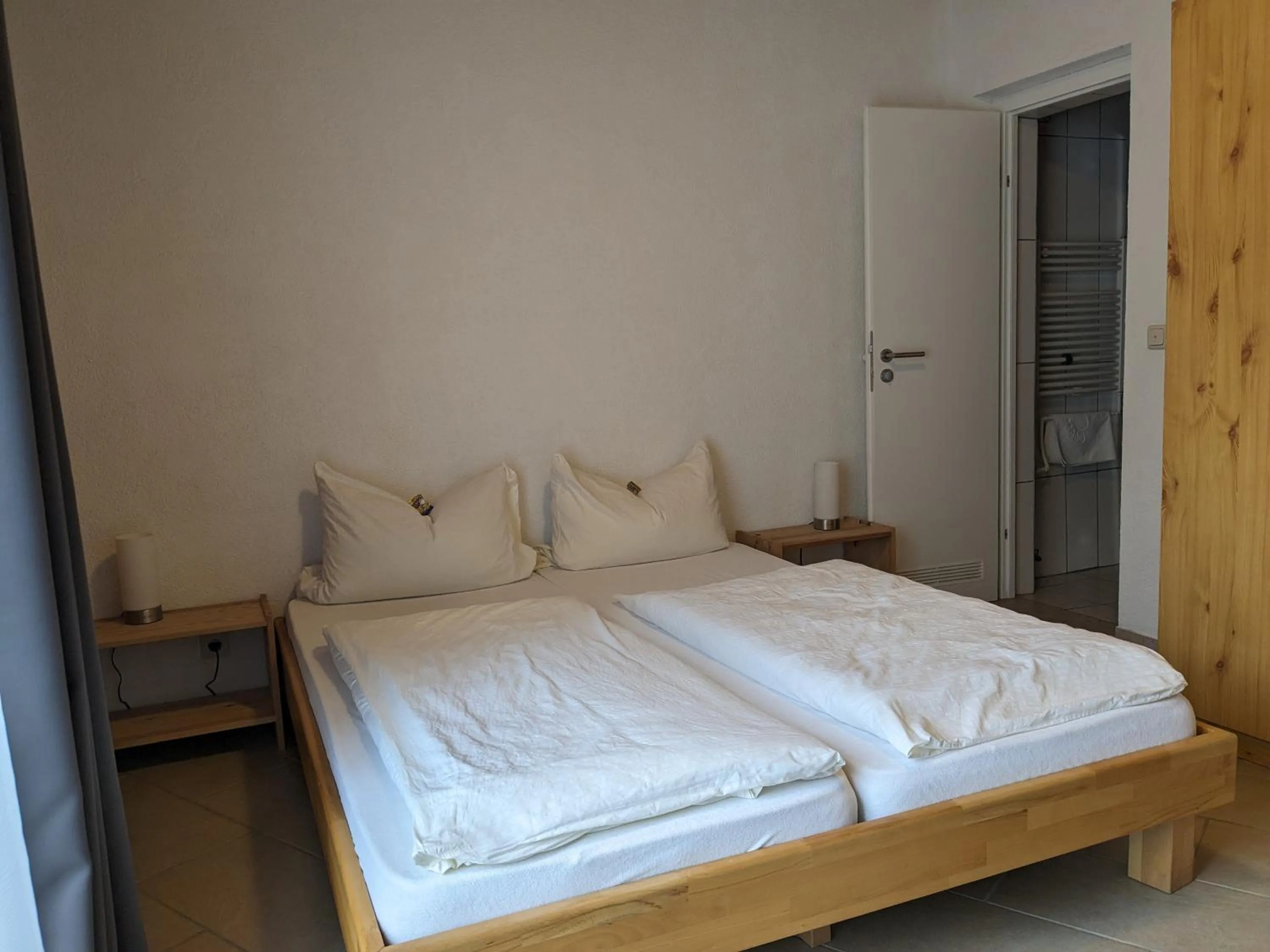 Bed in Hotel Pension Winzerhaus