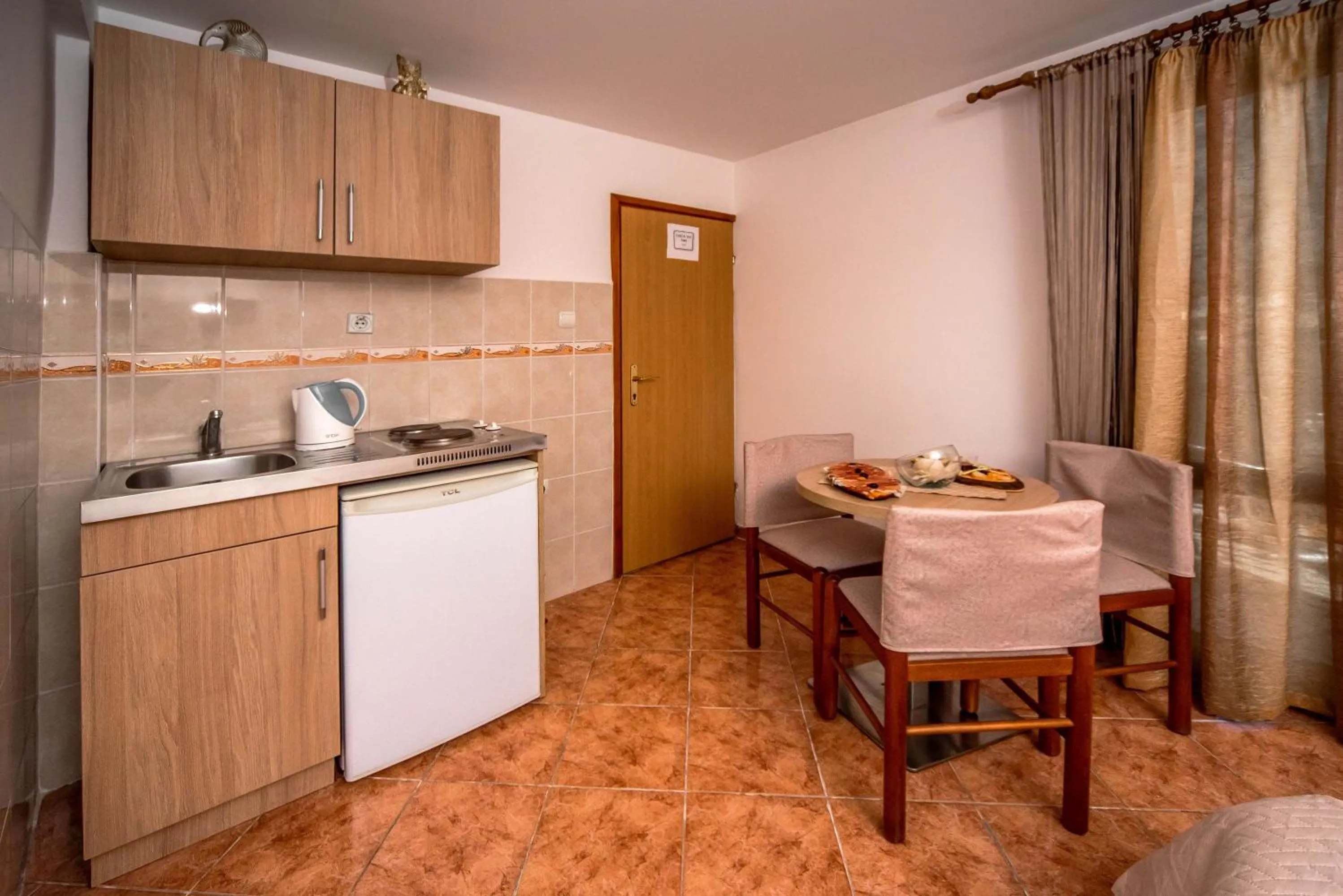Kitchen or kitchenette in Apartments Marković
