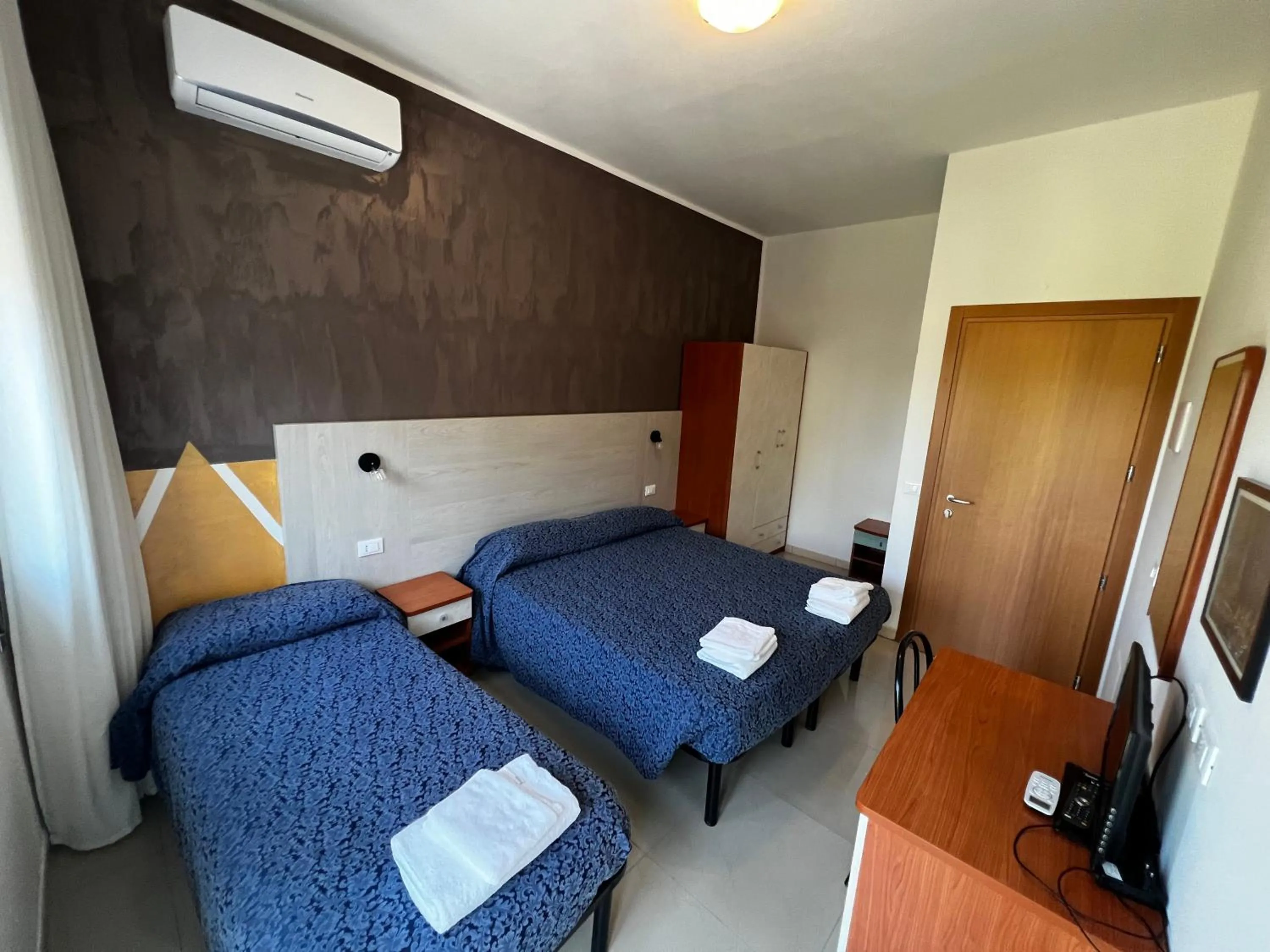 Bedroom in Club Vacanze In