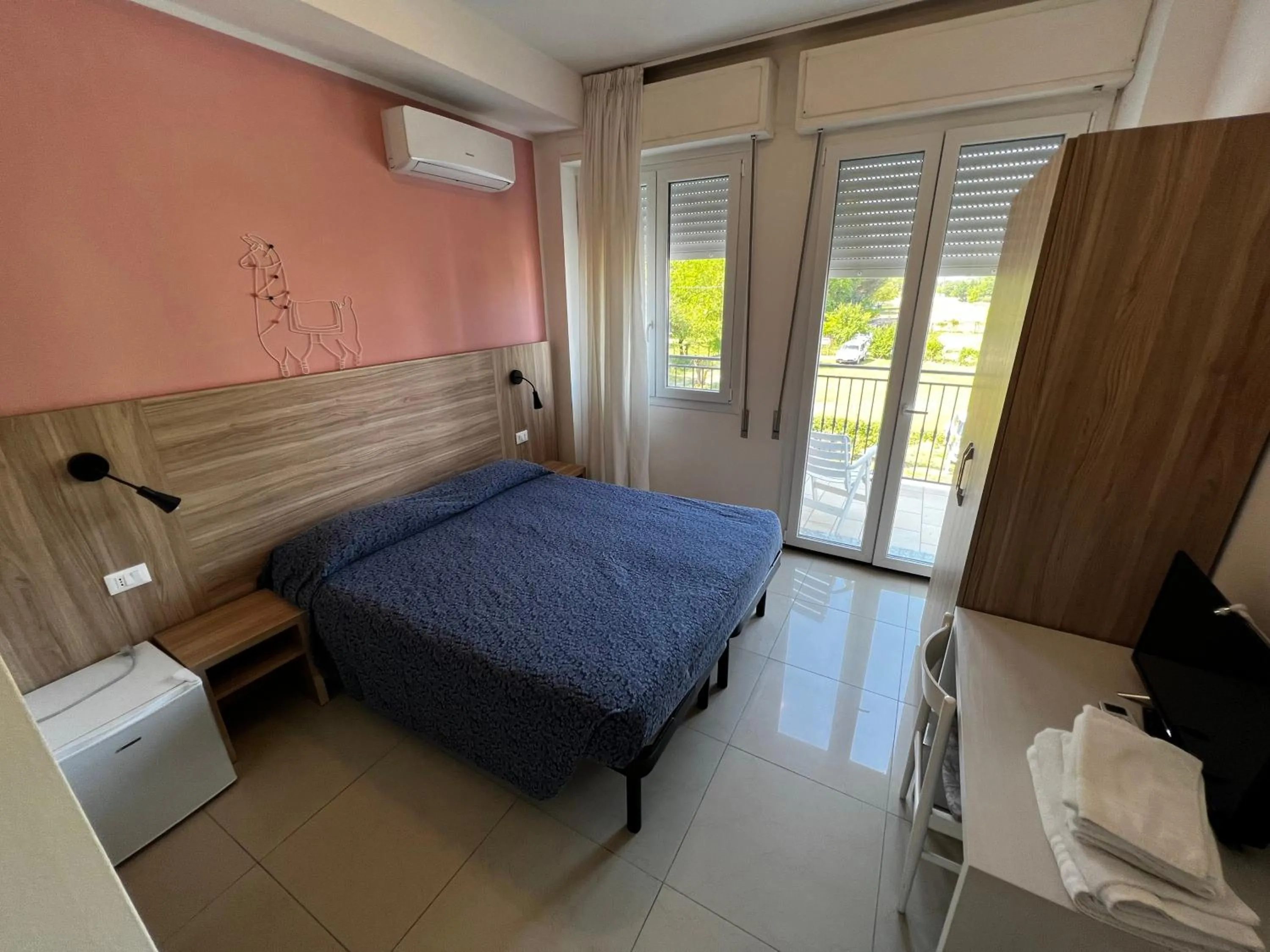 Bedroom in Club Vacanze In