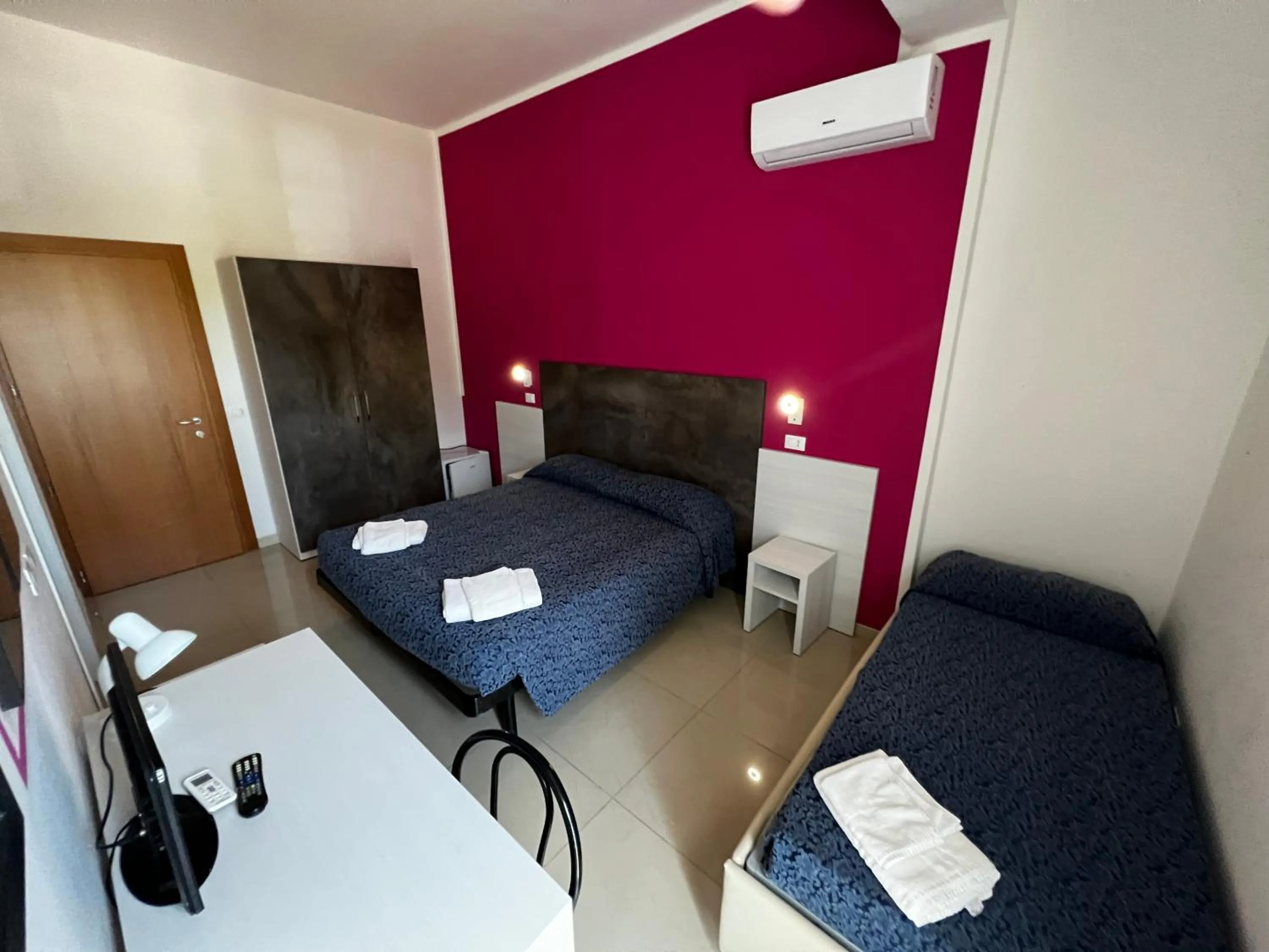 Bedroom in Club Vacanze In