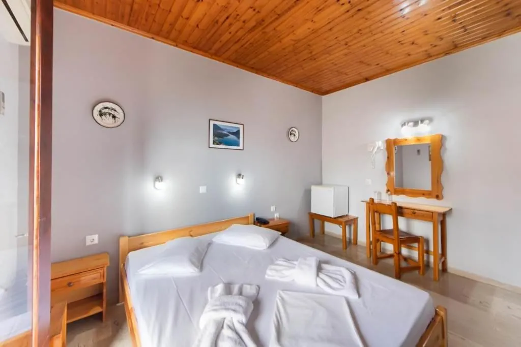 Bed in Hotel Nostos
