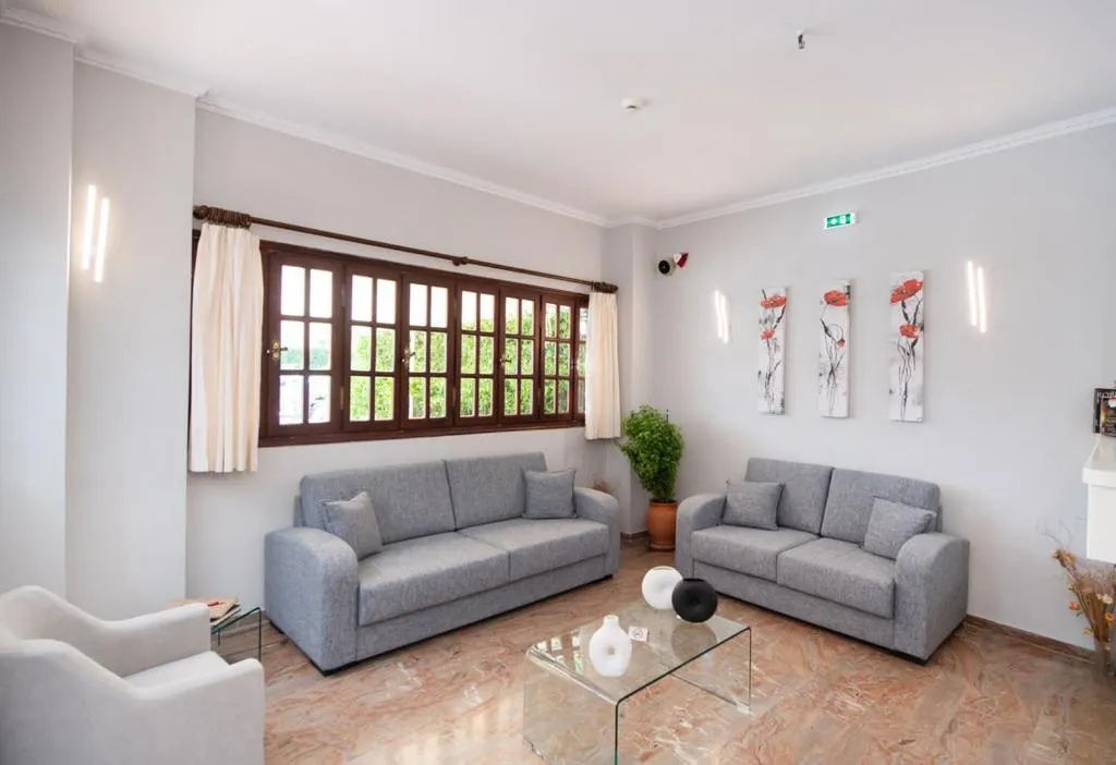 Communal lounge/ TV room in Hotel Nostos