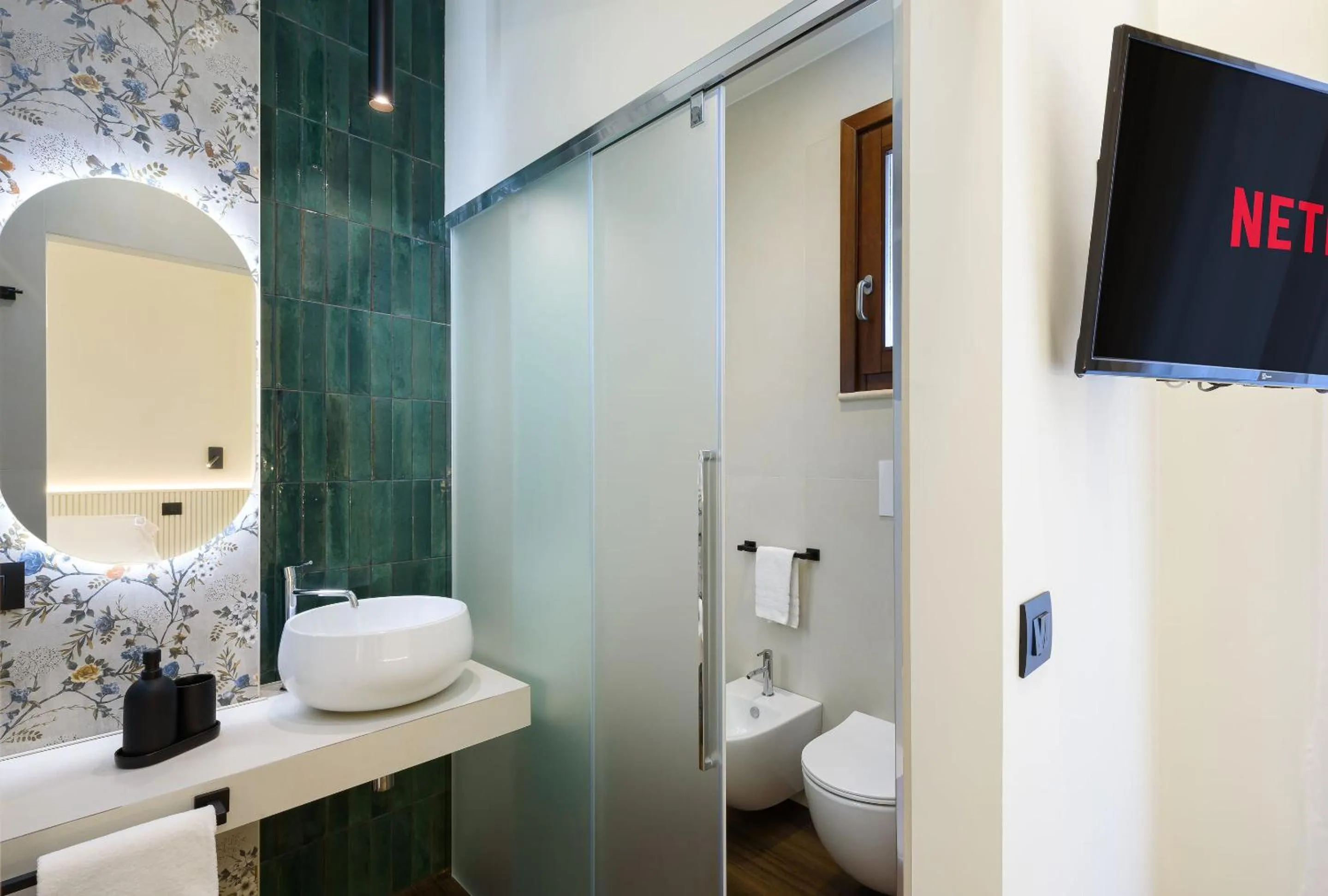 Bathroom in Albergo Auralba