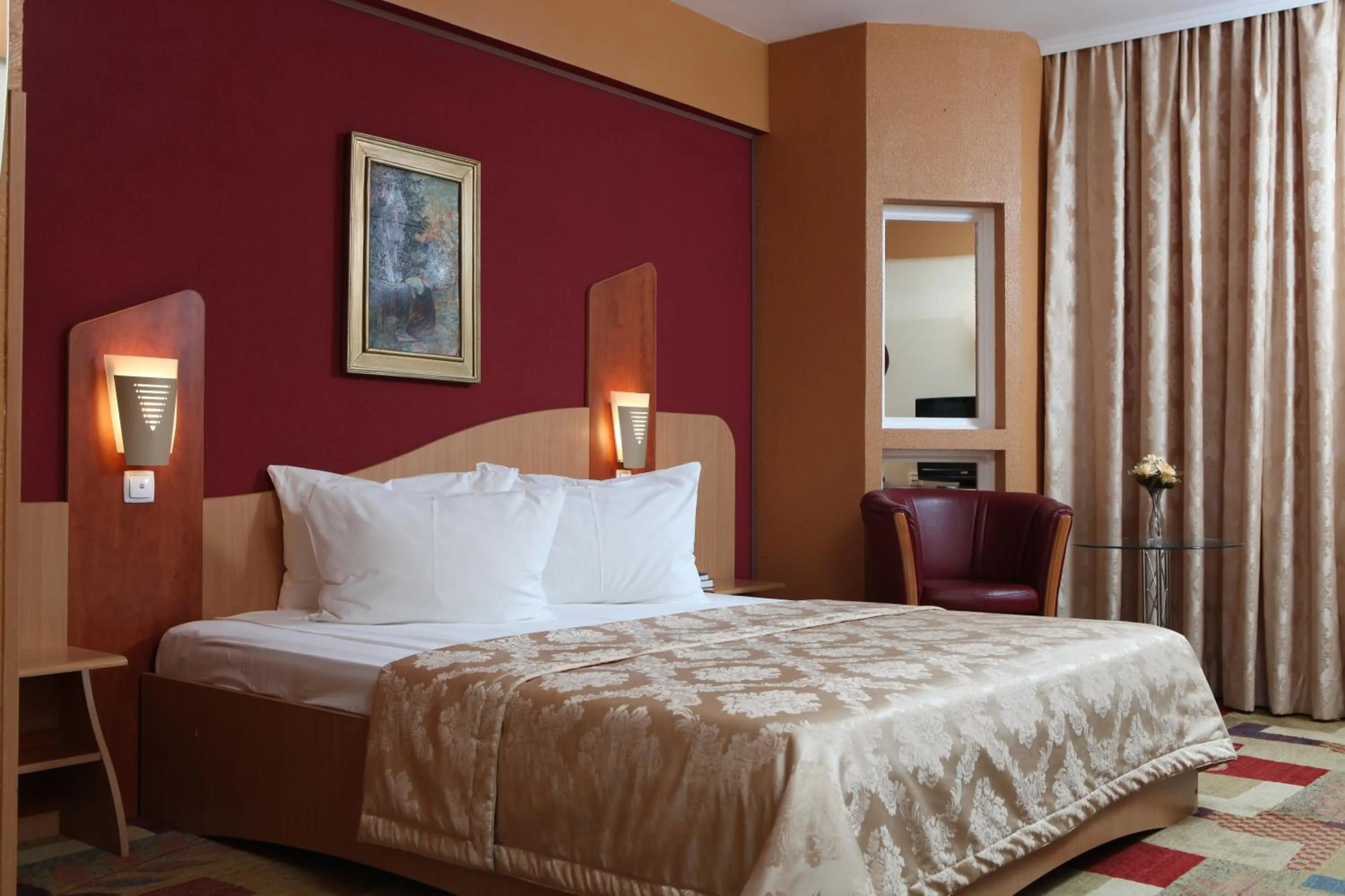 Bed in Ambassador Hotel