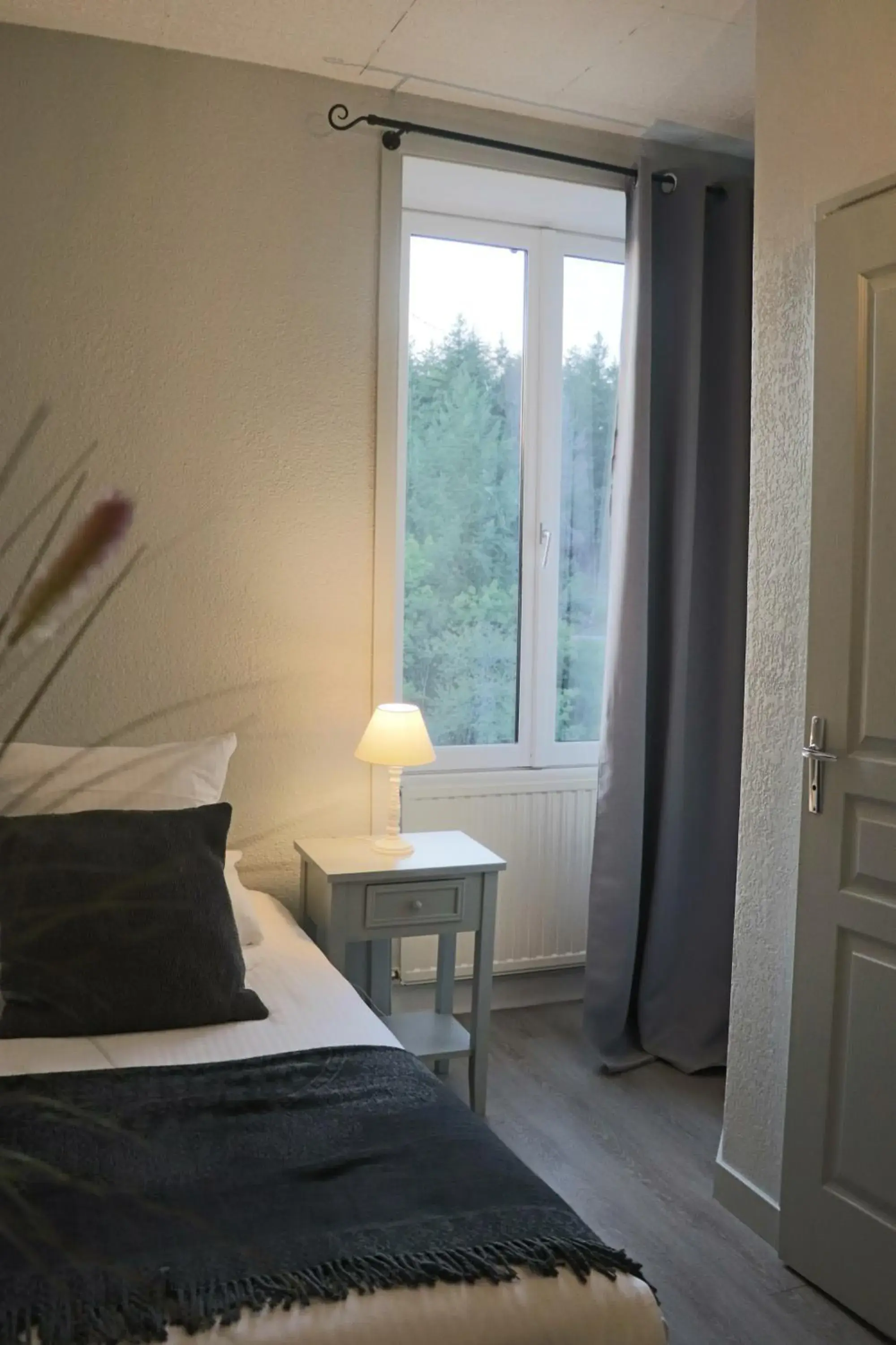 Photo of the whole room, Bed in Logis Hôtel Restaurant La Brasserie Photo of the whole room, Bed in Logis Hôtel Restaurant La Brasserie