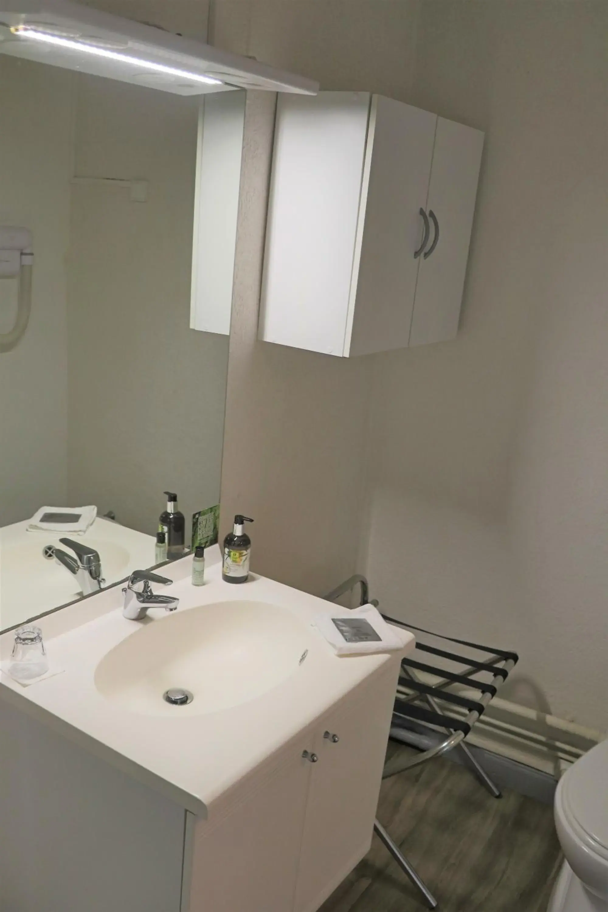 Bathroom in Logis Hôtel Restaurant La Brasserie Bathroom in Logis Hôtel Restaurant La Brasserie