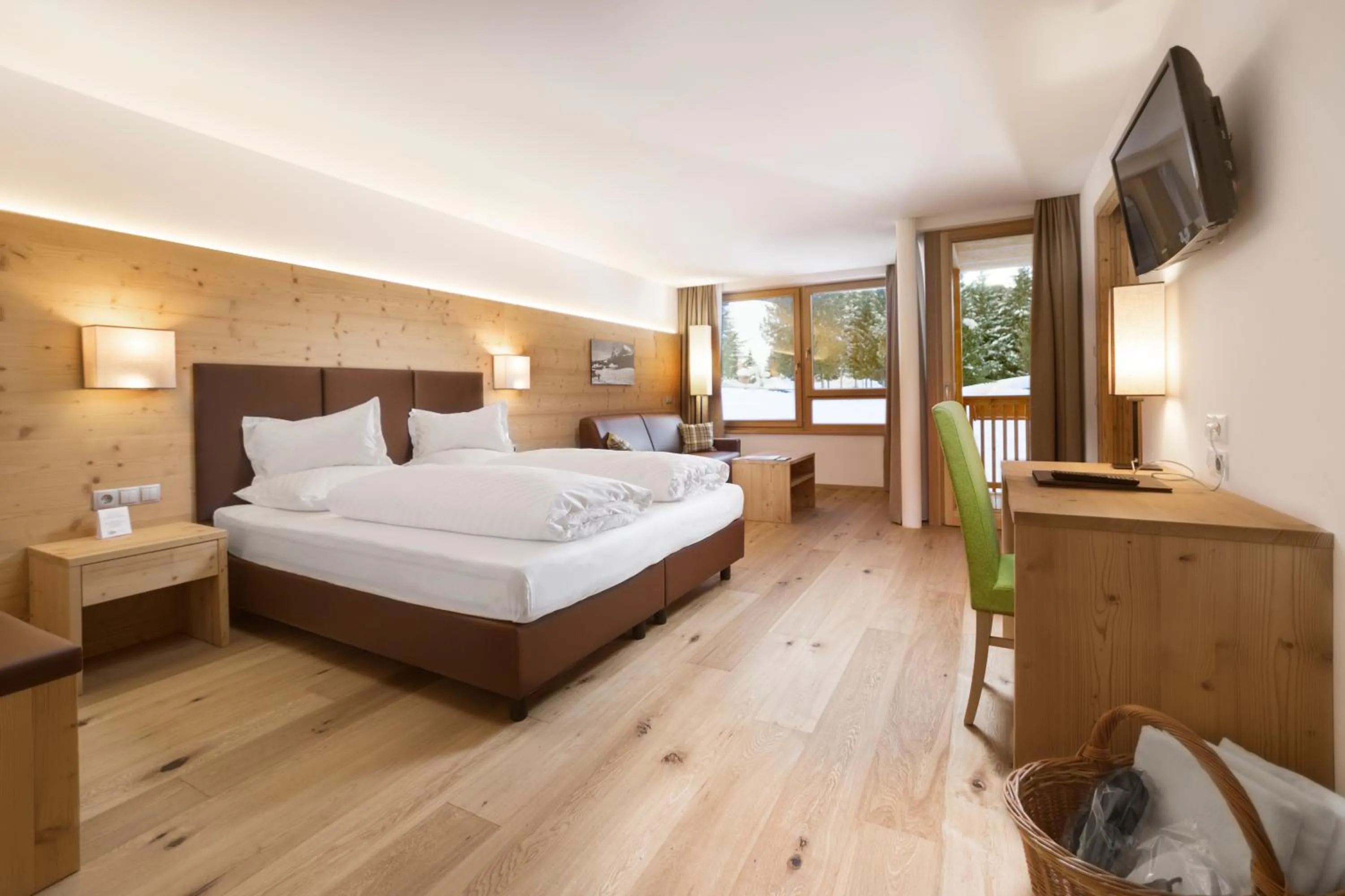Photo of the whole room, Bed in Sporthotel Floralpina