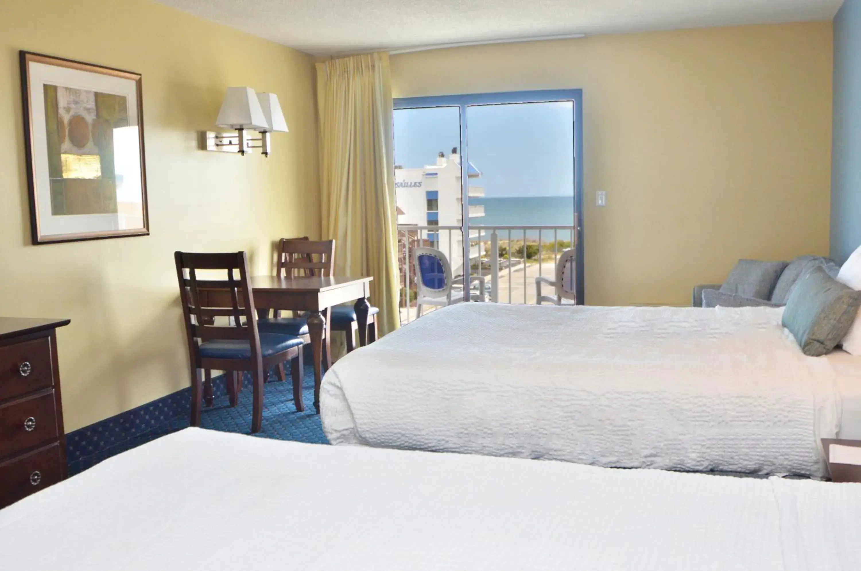 Partial Ocean View 2 Queens & Sofa - No Pets Allowed in Coastal Palms Inn and Suites Partial Ocean View 2 Queens & Sofa - No Pets Allowed in Coastal Palms Inn and Suites